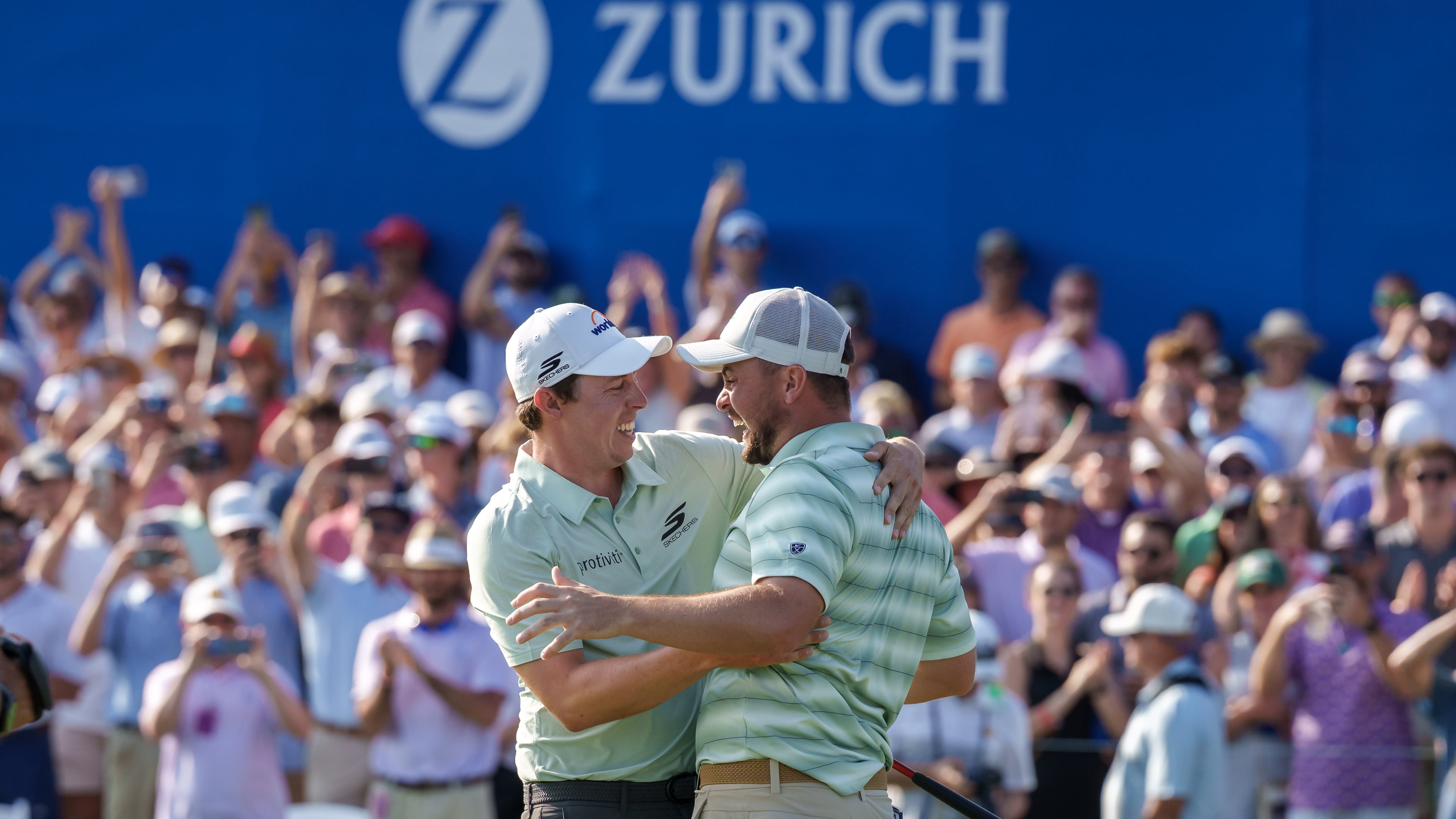 Alex Fitzpatrick, right, of England, reacts after sinking a birdie putt and winning the tournament with his brother Matt Fitzpatrick, left, during the final round of the PGA Zurich Classic of New Orleans golf tournament, Sunday, April 26, 2026, in Avondale, La. (AP Photo/Matthew Hinton)
