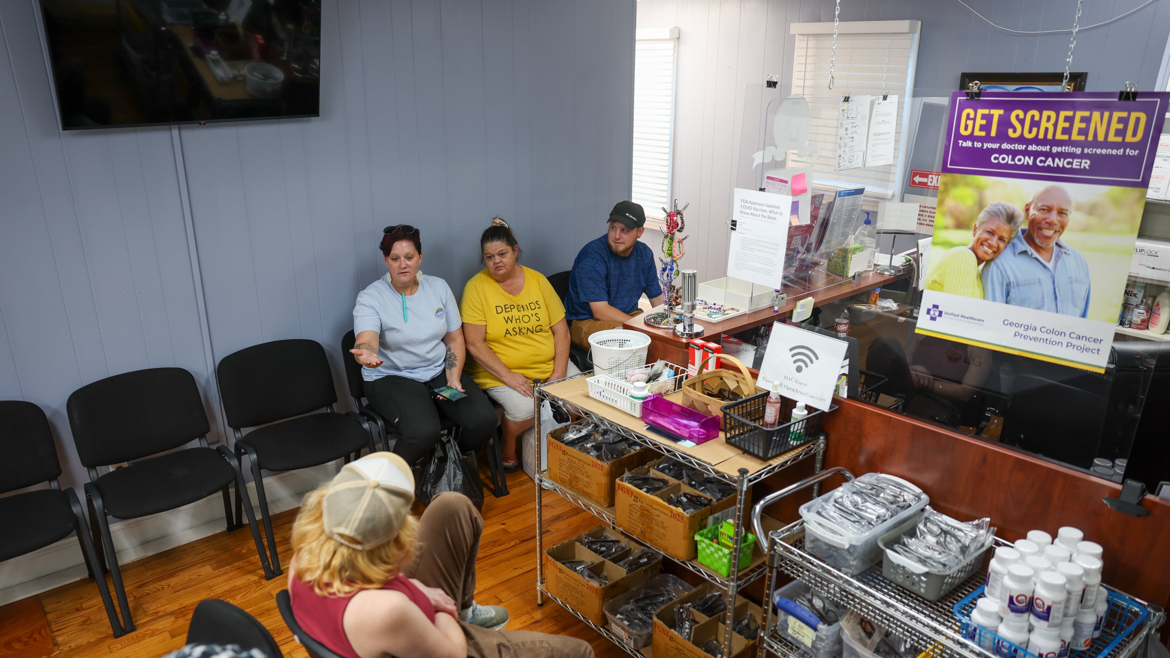 Patients wait at Open Arms Clinic in Toccoa that provides free care to low-income residents who make less than $20,000 a year. Since COVID-era enhanced Obamacare subsidies expired late last year, the clinic's patient load has doubled. (Arvin Temkar/AJC)