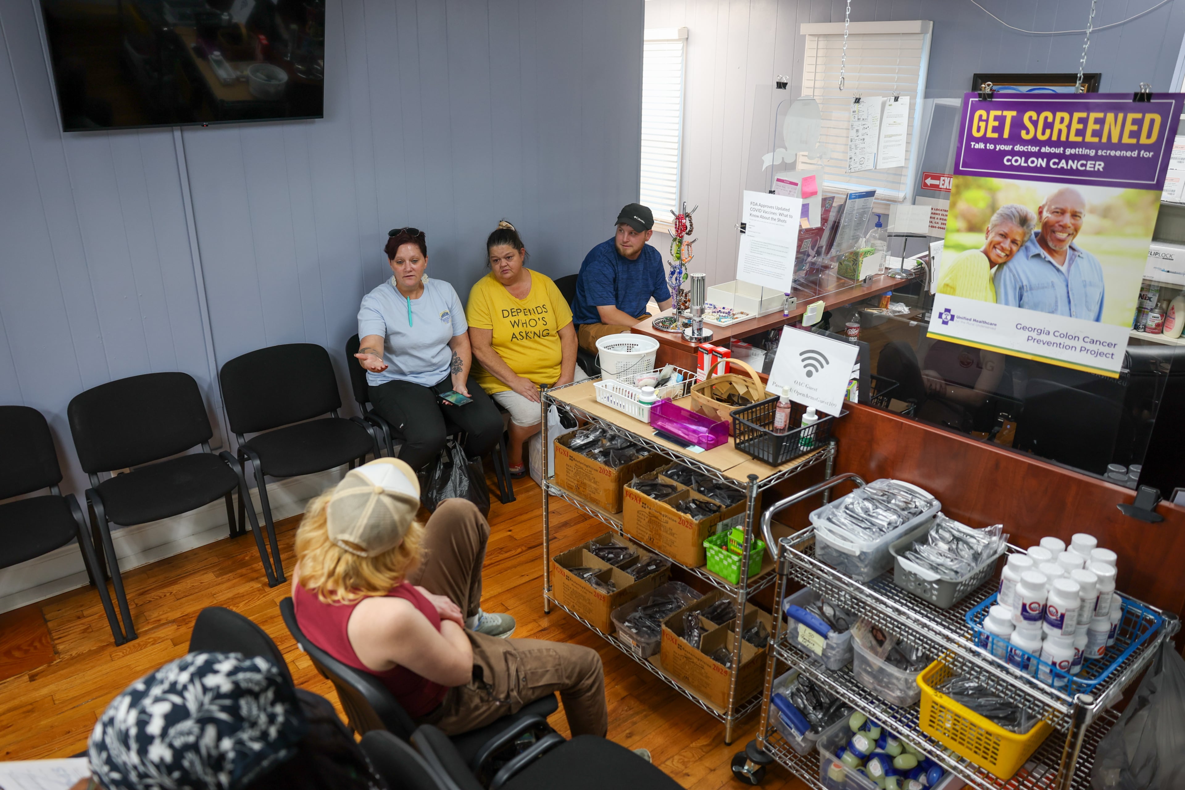 Patients wait at Open Arms Clinic in Toccoa that provides free care to low-income residents who make less than $20,000 a year. Since COVID-era enhanced Obamacare subsidies expired late last year, the clinic's patient load has doubled. (Arvin Temkar/AJC)