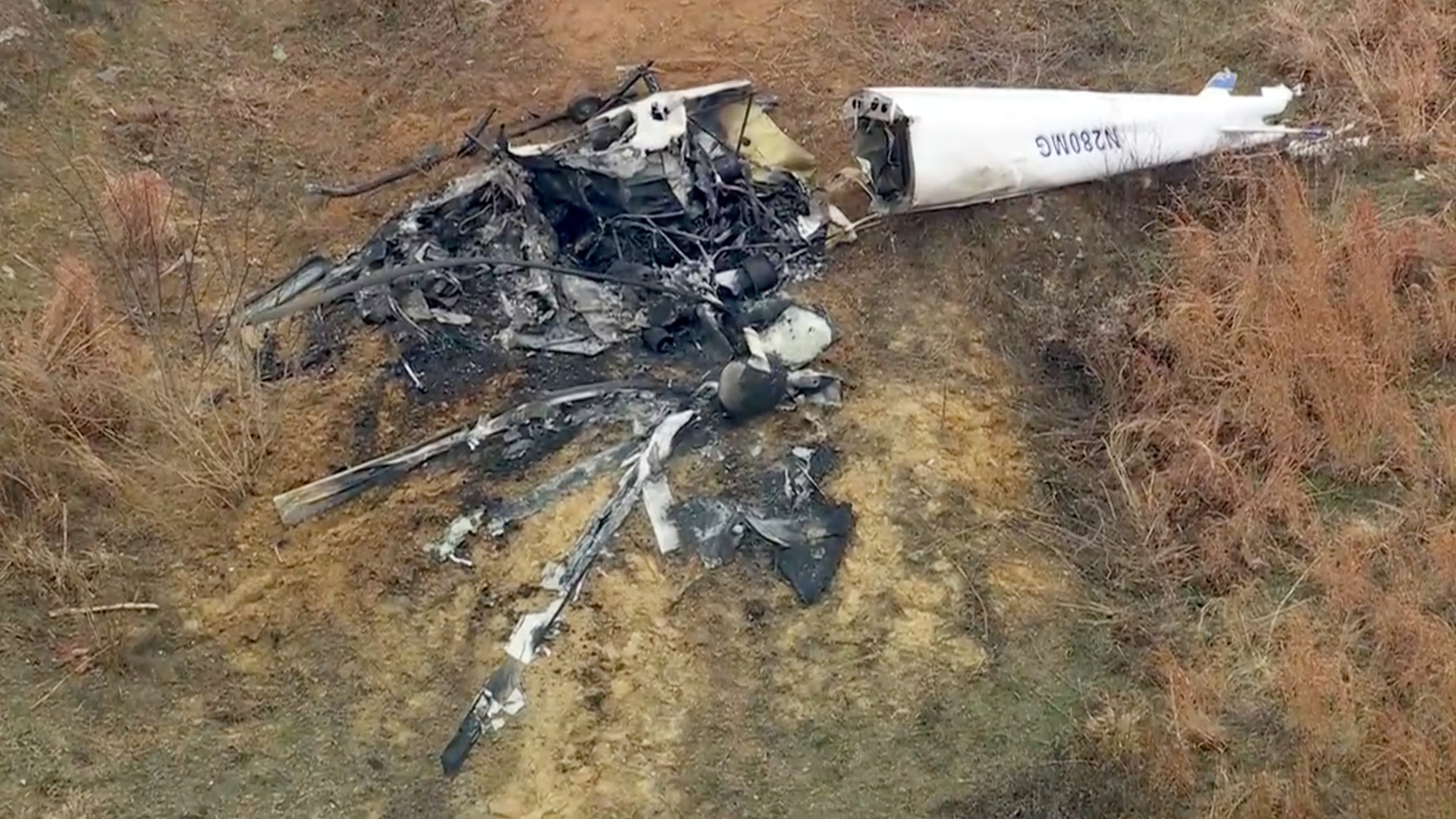 Debris from a helicopter is shown after two helicopters crashed in Hammonton, N.J., on Sunday, Dec. 28, 2025. (WPVI-TV/6ABC via AP)