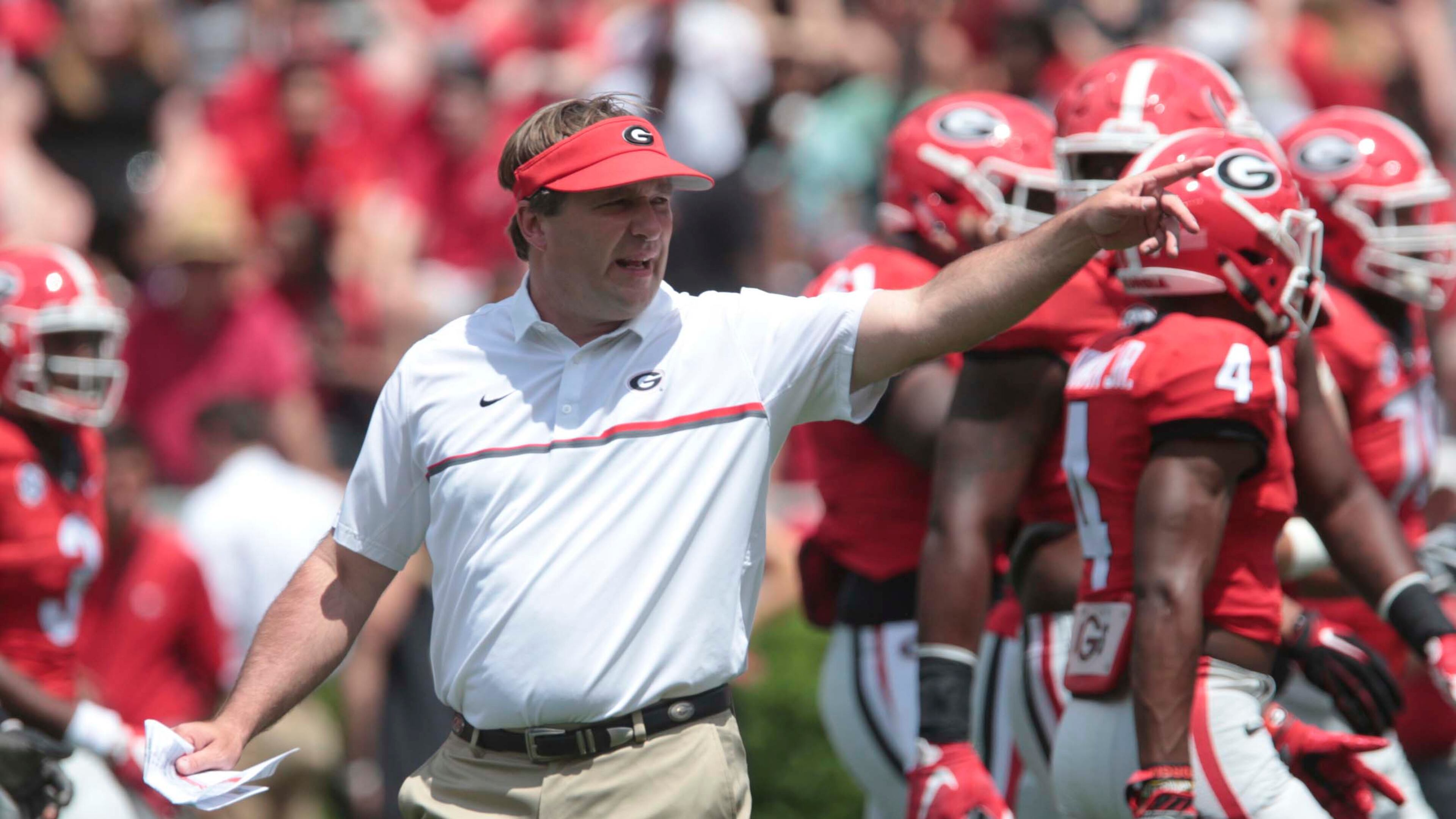 Georgia coach Kirby Smart calls plays from the field during the NCAA college football team's G Day at Sanford Stadium in Athens, Ga., Saturday, April 22, 2017. (John Roark/Athens Banner-Herald via AP)