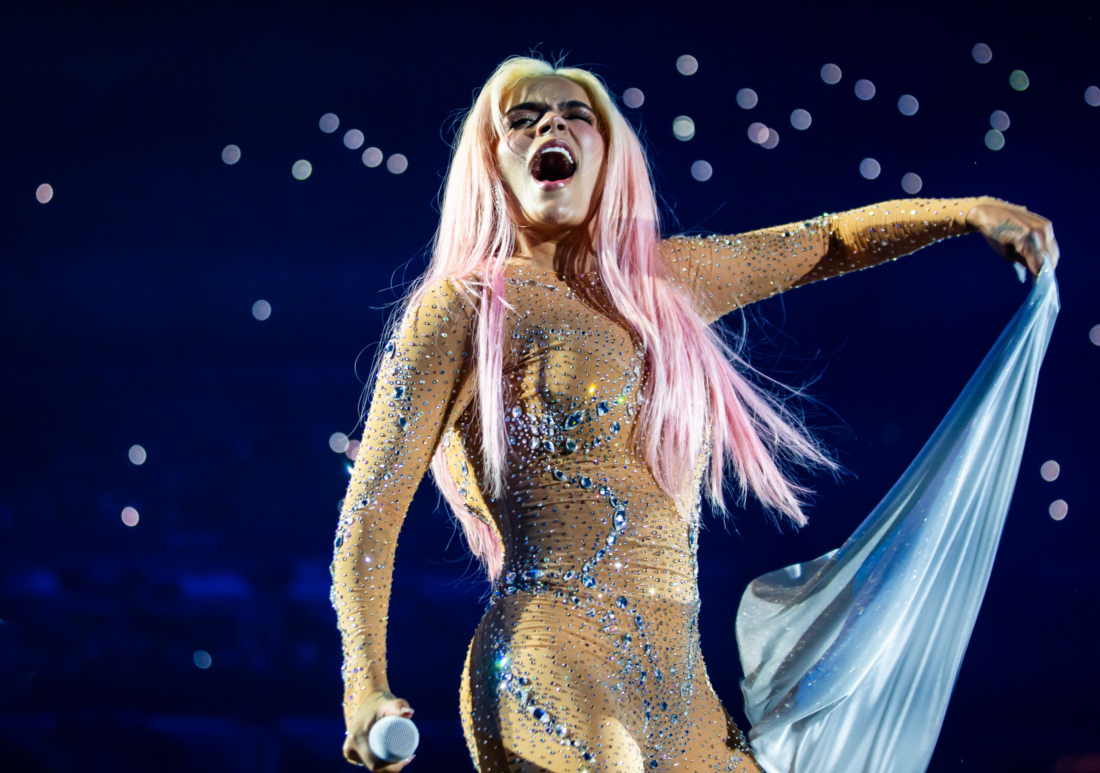 Karol G brought a stunning performance to Mercedes-Benz Stadium on Thursday, Sept. 21, 2023,where the throng of fans showed up in their best Karol G-inspired outfits. (Ryan Fleisher FOR THE ATLANTA JOURNAL-CONSTITUTION)