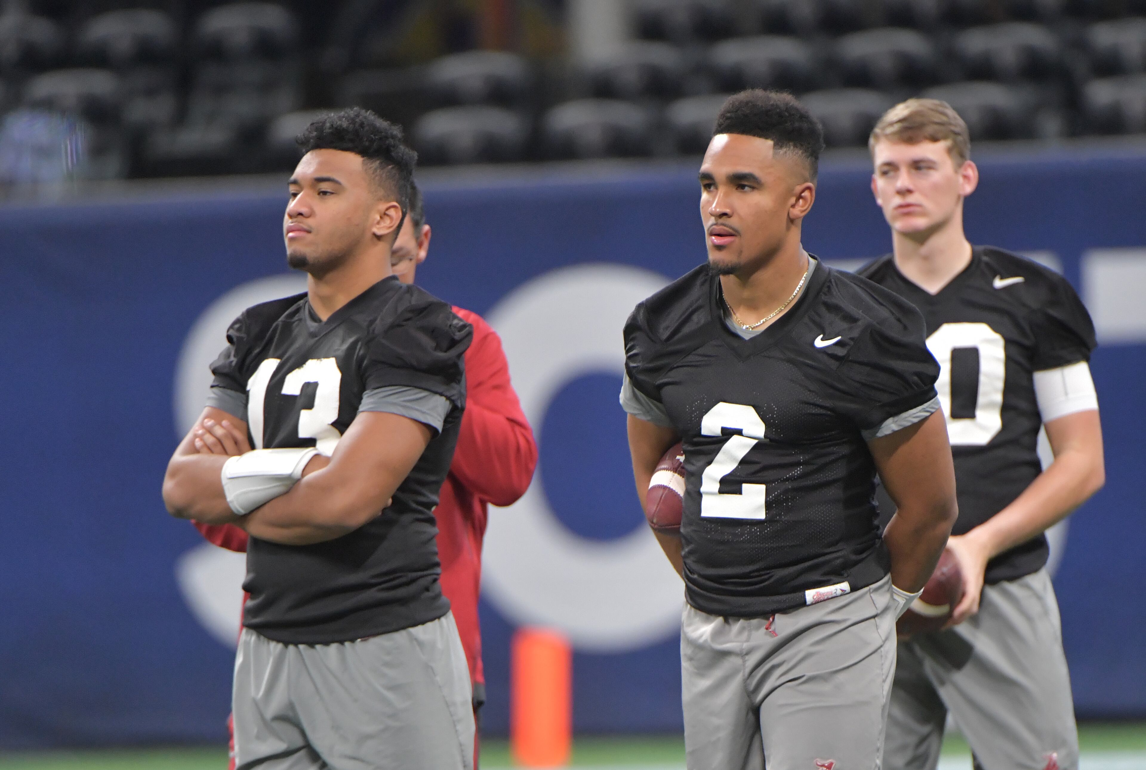 November 30, 2018 Atlanta - Alabama quarterback Tua Tagovailoa (13) and quarterback Jalen Hurts (2) are on the football field during their team practice at Mercedes-Benz Stadium on Friday, November 30, 2018. HYOSUB SHIN / HSHIN@AJC.COM