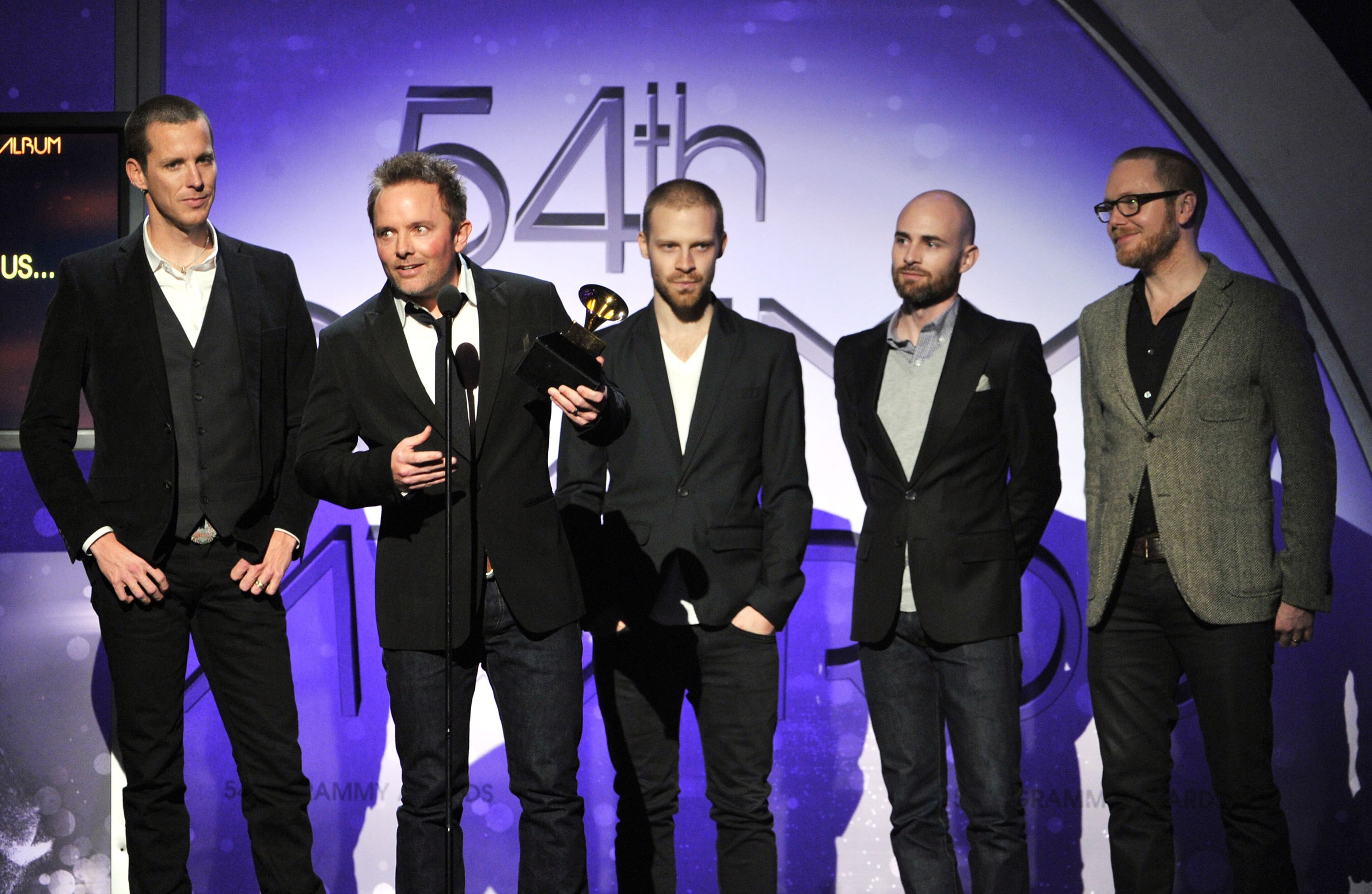 LOS ANGELES, CA - FEBRUARY 12: Chris Tomlin (2nd from L) accepts the GRAMMY for Best Contemporary Christian Music Album in "And If Our God Is for Us...." onstage at the 54th Annual GRAMMY Awards held at Staples Center on February 12, 2012 in Los Angeles, California. (Photo by Kevin Winter/Getty Images)