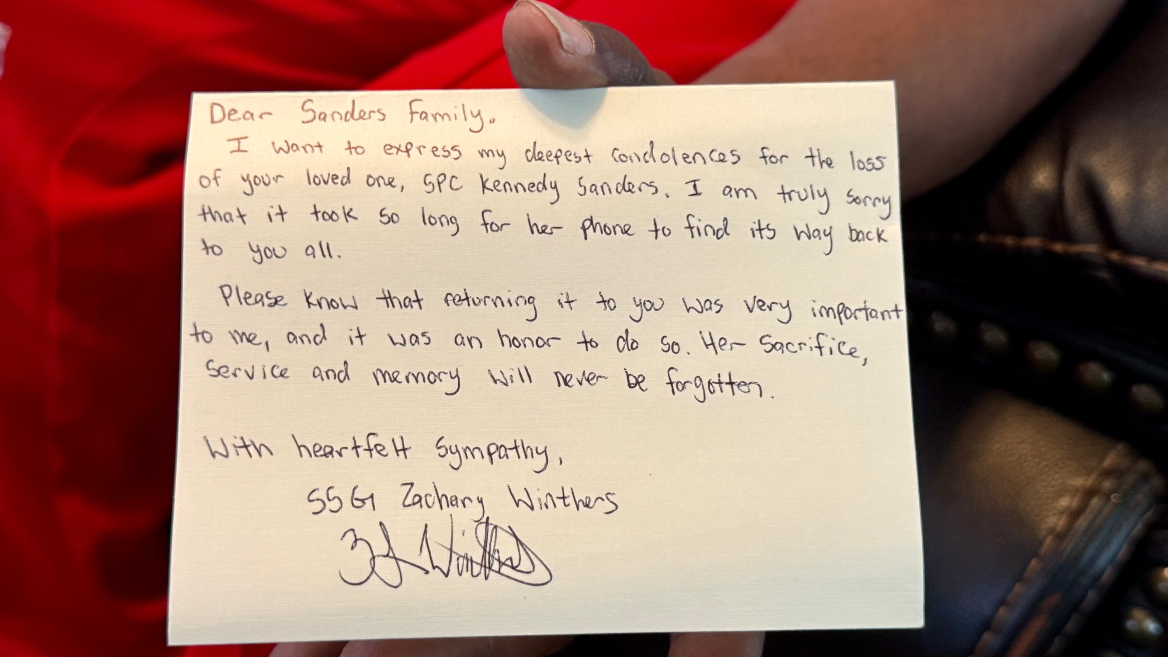 Staff Sgt. Zachary Winthers of the Illinois Army National Guard wrote a note to the parents of Sgt. Kennedy L. Sanders, who was killed in a drone bomb attack on her barracks in Jordan in 2024. Winthers found her missing cellphone and returned it to her family. (Courtesy)