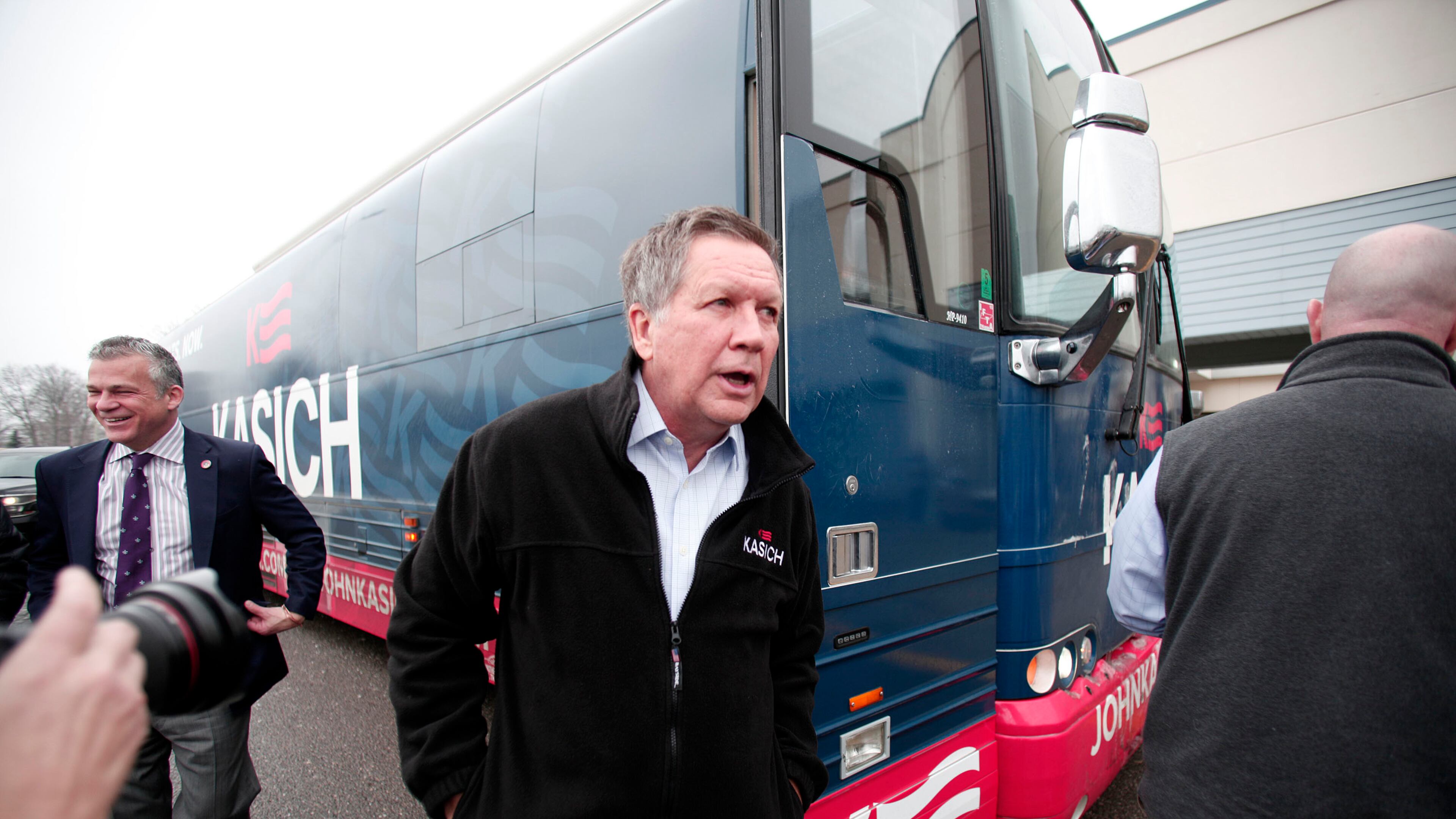 Ohio governor and Republican presidential candidate John Kasich arrives at a town hall meeting on Tuesday in Livonia, Michigan. Bill Pugliano/Getty Images
