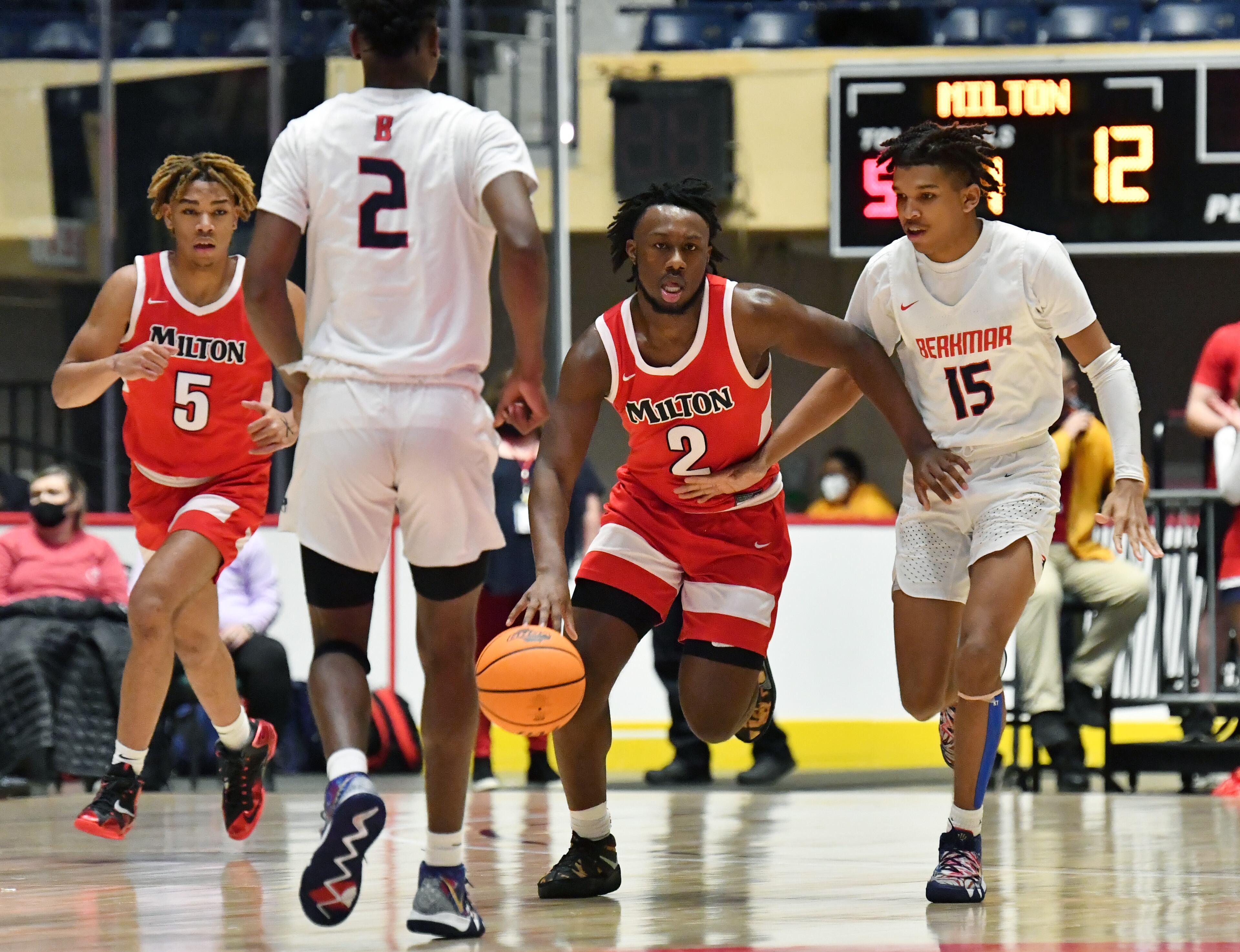 March 13, 2021 Macon - Milton's Bruce Thornton (2) brings the ball upcourt during the 2021 GHSA State Basketball Class AAAAAAA Boys Championship game at the Macon Centreplex in Macon on Saturday, March 13, 2021 Milton won 52-47 over Berkmar. (Hyosub Shin / Hyosub.Shin@ajc.com)