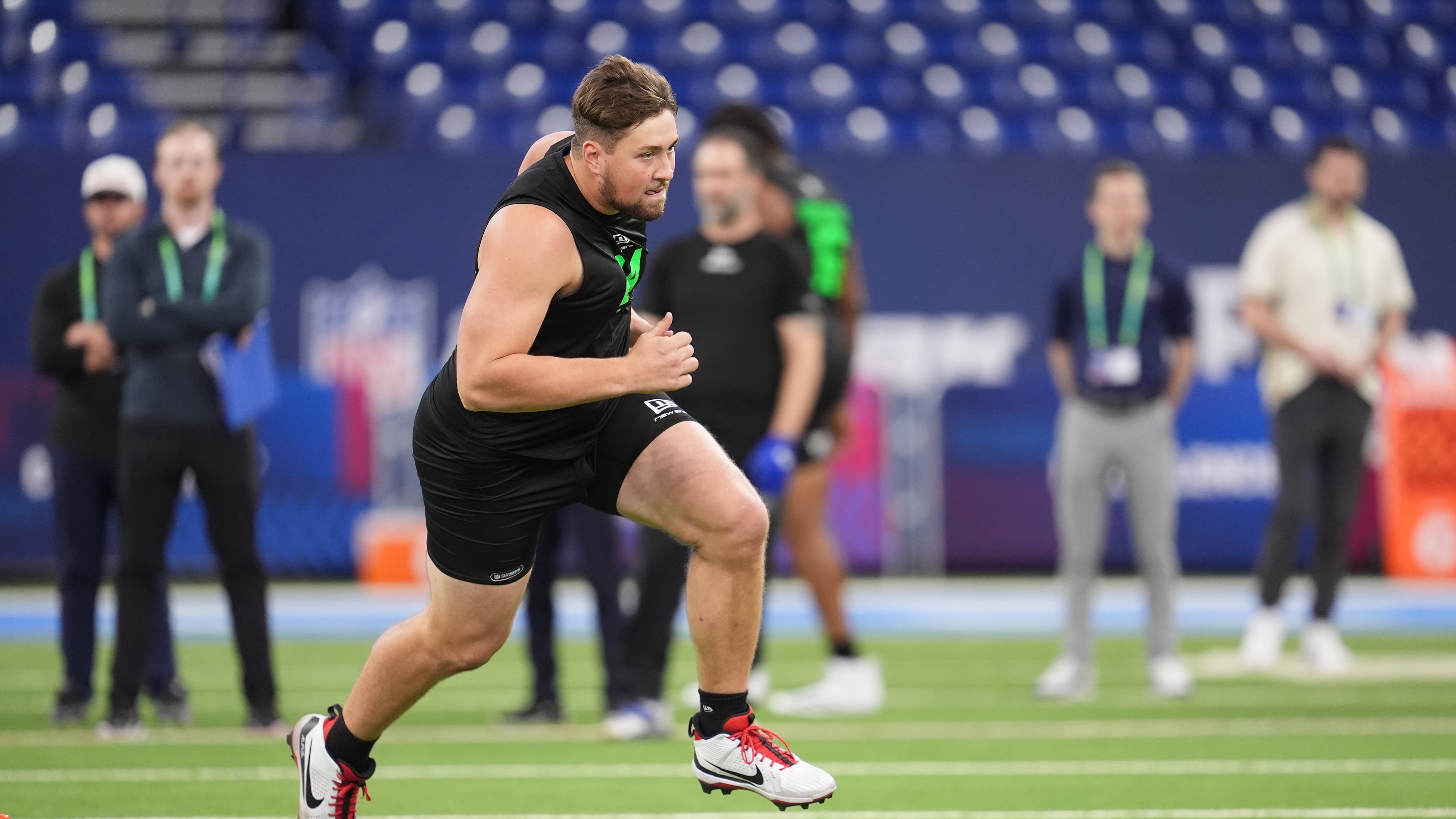 Georgia offensive lineman Monroe Freeling runs a drill at the NFL combine in Indianapolis on Sunday, March 1, 2026. Freeling's workout likely increased his NFL draft stock. (Michael Conroy/AP)