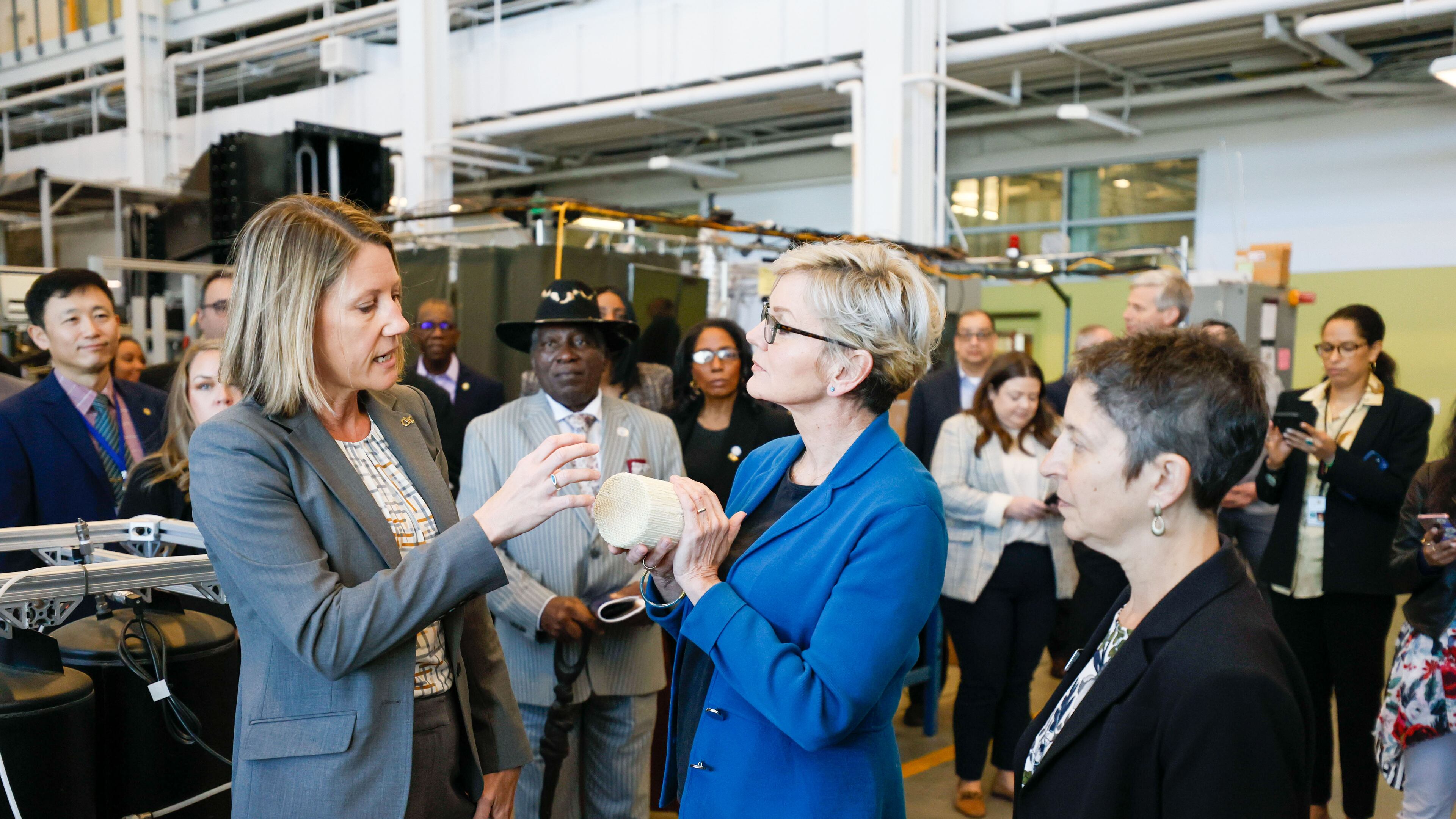 Krista Walton, a Georgia Tech professor and Robert Moeller faculty fellow, speaks with Energy Secretary Jennifer M. Granholm during a tour of an energy lab at Georgia Tech on Thursday, April 4, 2024. Granholm's other Atlanta stops included the Russell Innovation Center for Entrepreneurs and Morehouse College. (Miguel Martinez /miguel.martinezjimenez@ajc.com)