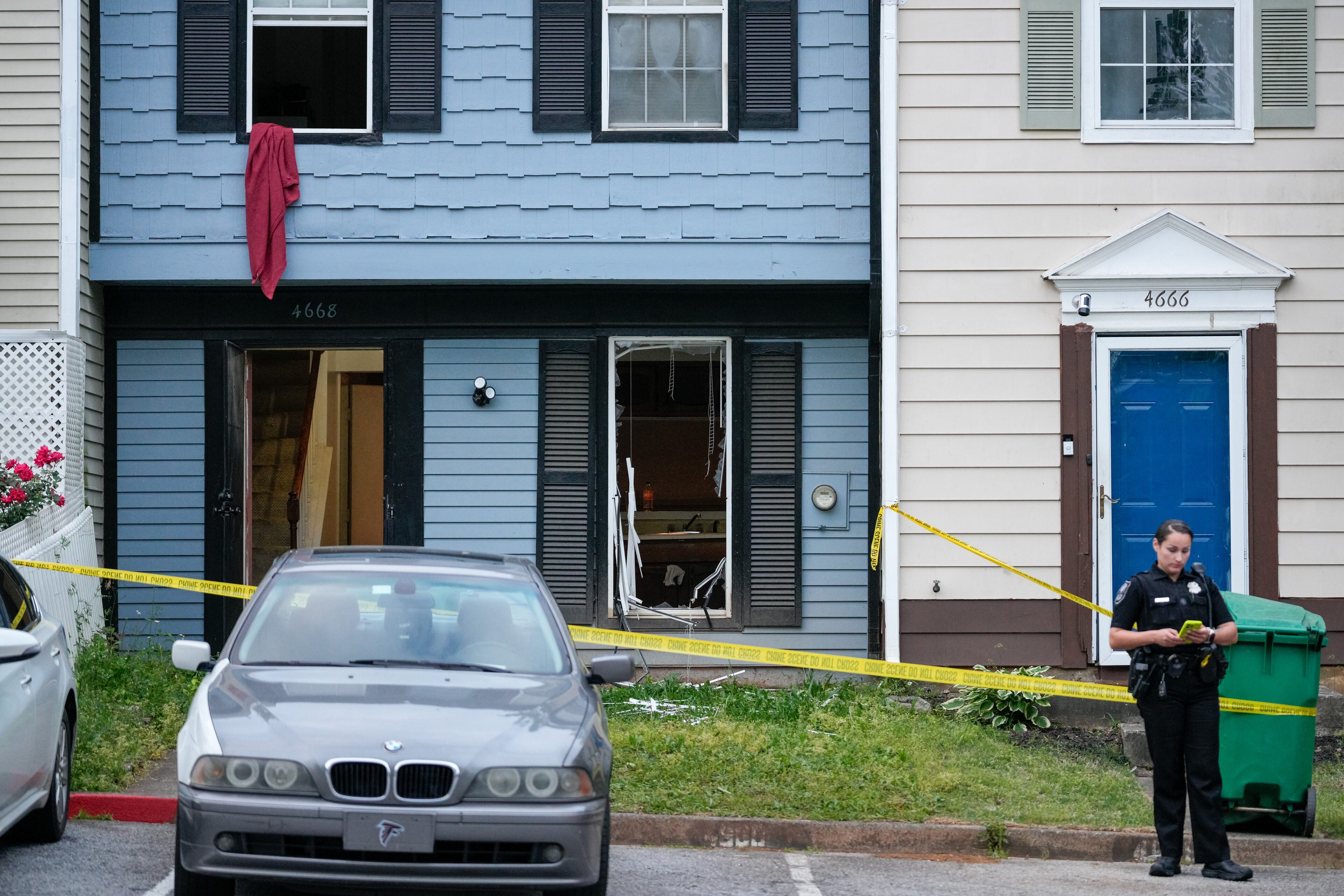 DeKalb police helped rescue multiple people from an upstairs window after a shooting at a residence on Longman Way that left two dead and injured three, early morning Monday, April 28, 2025. (Ben Hendren for the AJC)