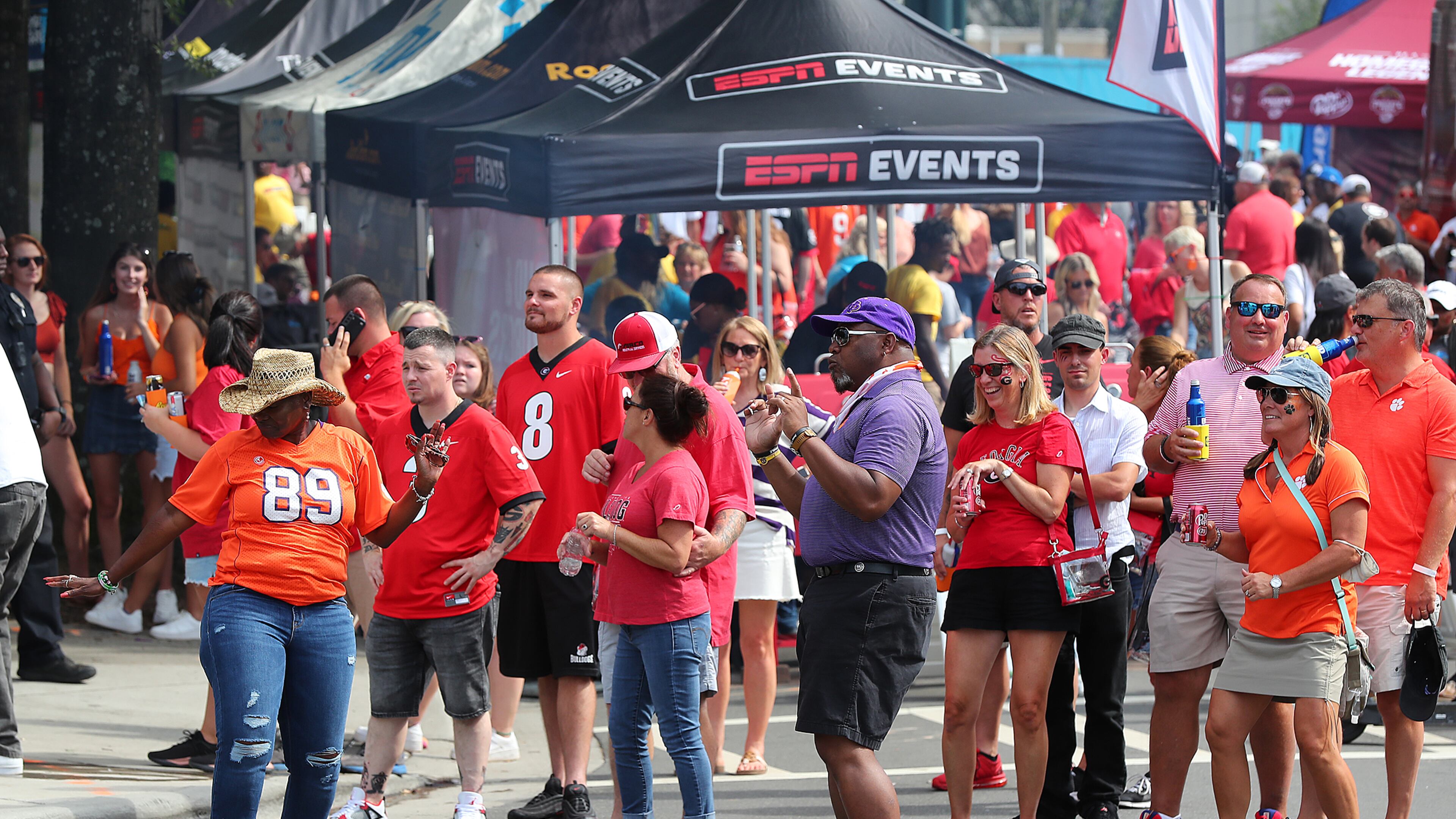Georgia and Clemson fans fill the streets outside Bank of America Stadium as the teams prepare to play in a NCAA college football game on Saturday, Sept 4, 2021, in Charlotte. “Curtis Compton / Curtis.Compton@ajc.com”