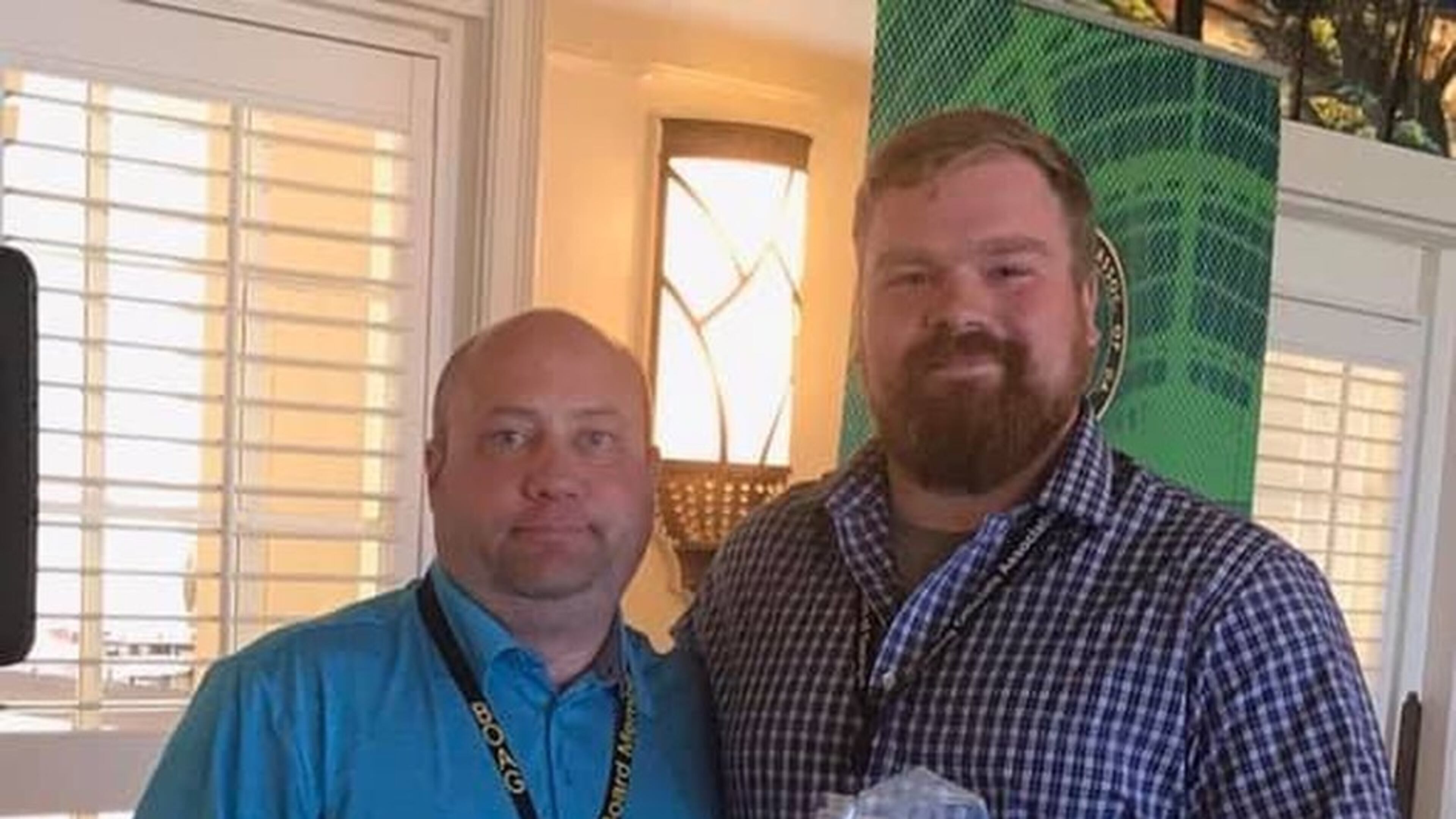 The Building Officials Association of Georgia recently honored City of Woodstock Senior Building Inspector Jake Hill with the 2019 Georgia Inspector of the Year Award. Pictured: (left) Josh Roth, President of the Building Officials Association of Georgia, and (right) Jake Hill, Senior Building Inspector of City of Woodstock.