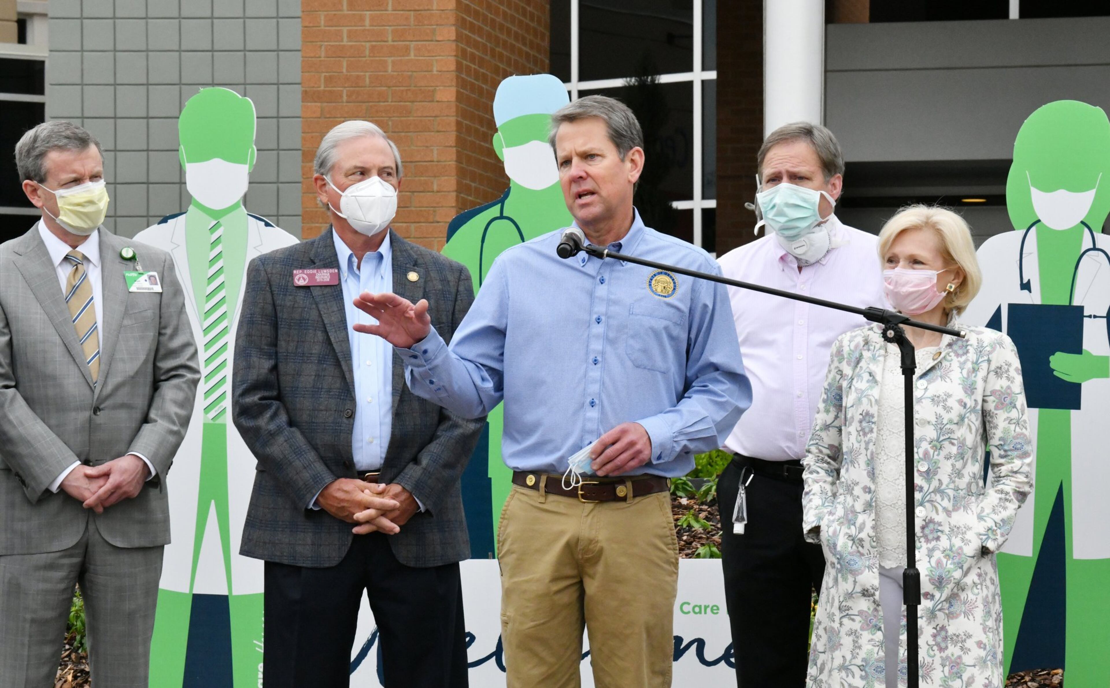 Early in the pandemic, Floyd Medical Center in northwest Georgia was deluged with COVID-19 patients after the area suffered one of the state's first outbreaks. The state helped fund extra resources for the hospital. Here, Governor Brian Kemp speaks after he toured a temporary medical pod and a pop-up hospital in the parking garage at Floyd Medical Center on May 13, 2020. (PHOTO by Hyosub Shin / Hyosub.Shin@ajc.com)