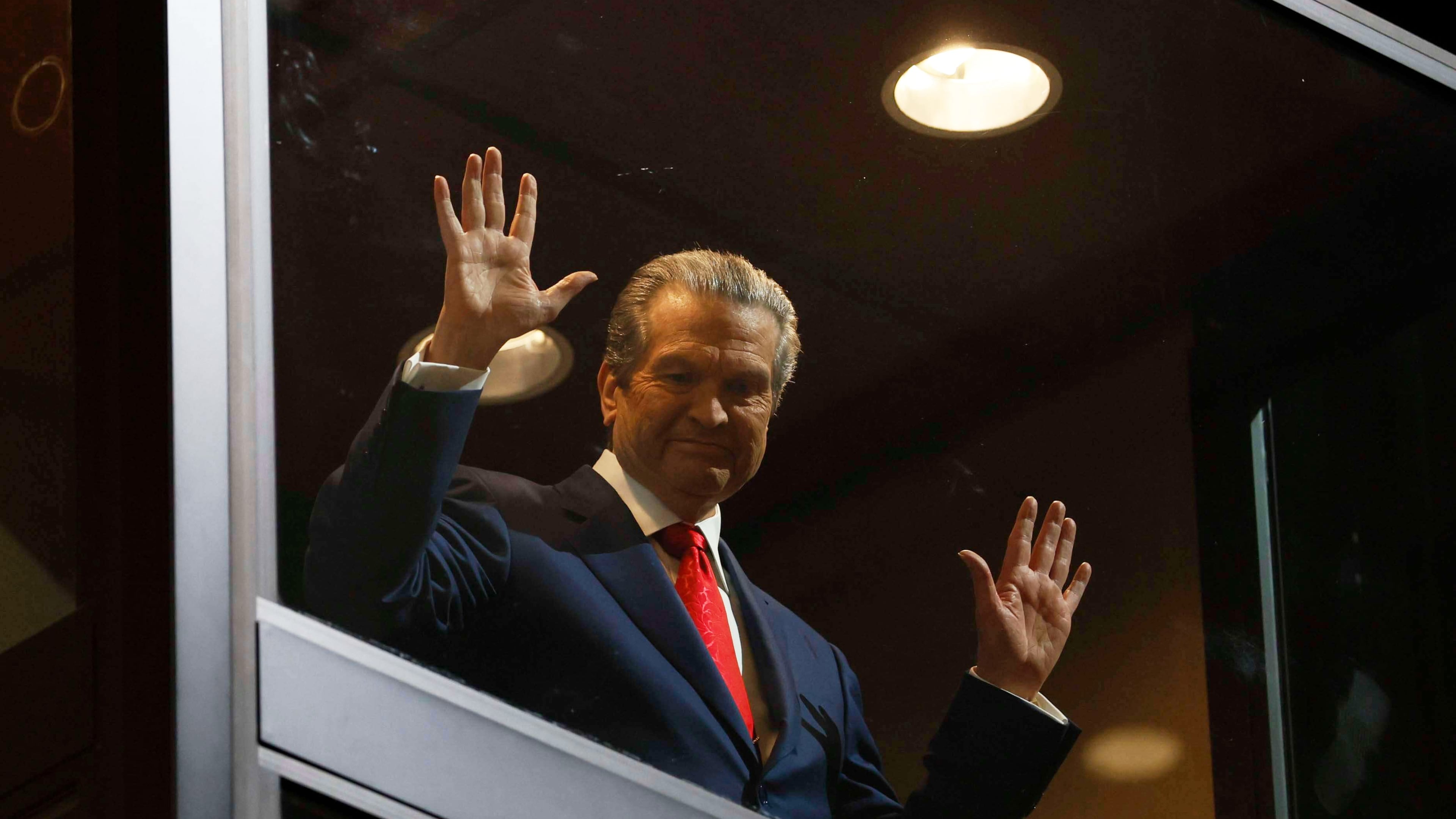 Healthcare business owner Rick Jackson waves to supporters as he comes down in an elevator for his campaign kickoff speech for Georgia governor at Jackson Healthcare, in Alpharetta, Ga., Wednesday, Feb. 4, 2026. (Miguel Martinez/Atlanta Journal-Constitution via AP)