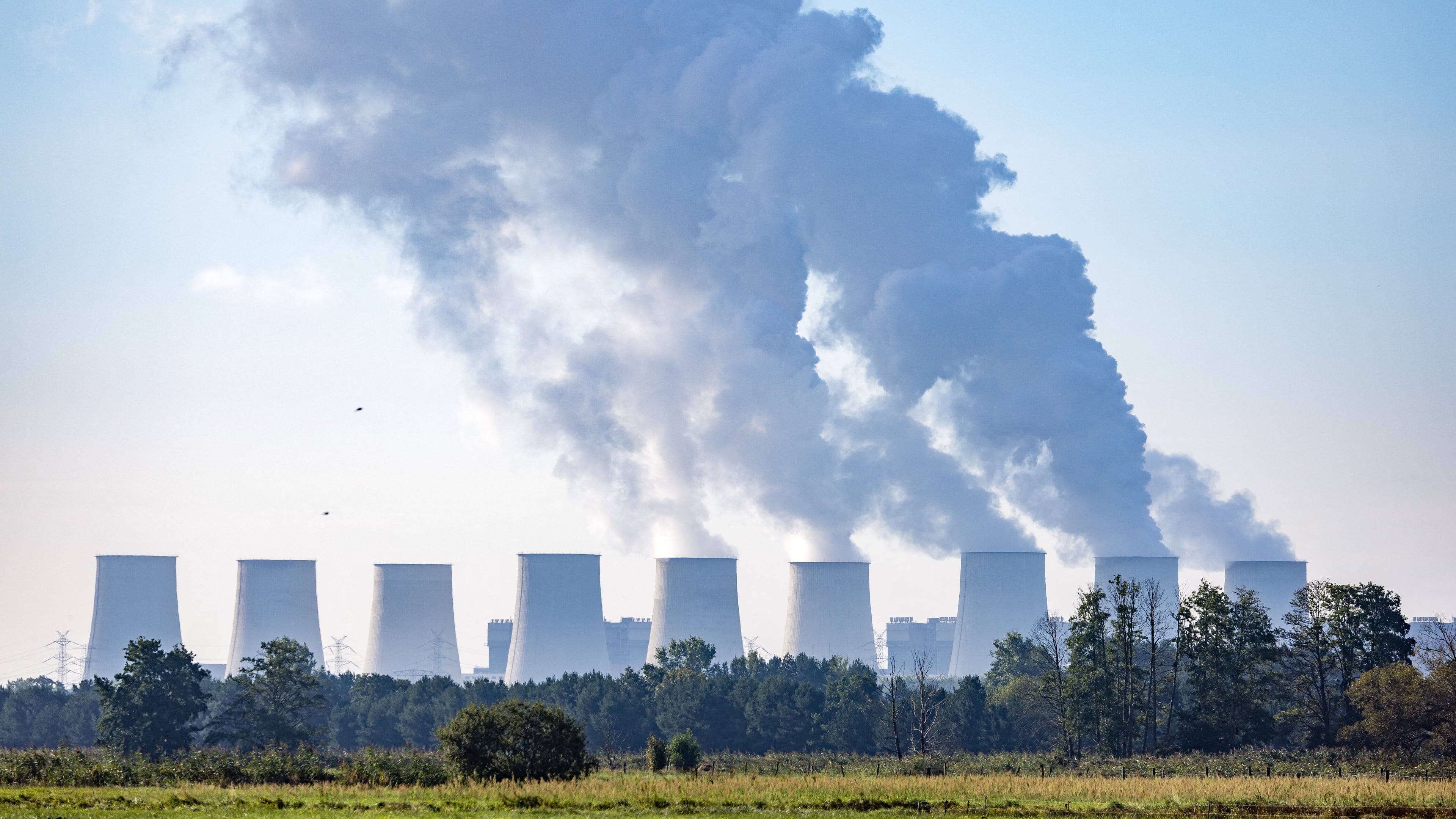 Water vapor rises from the cooling towers at the Jänschwalde power plant in Turnow-Preilack, Germany, Wednesday, Sept. 2, 2026. (Frank Hammerschmidt/dpa via AP)