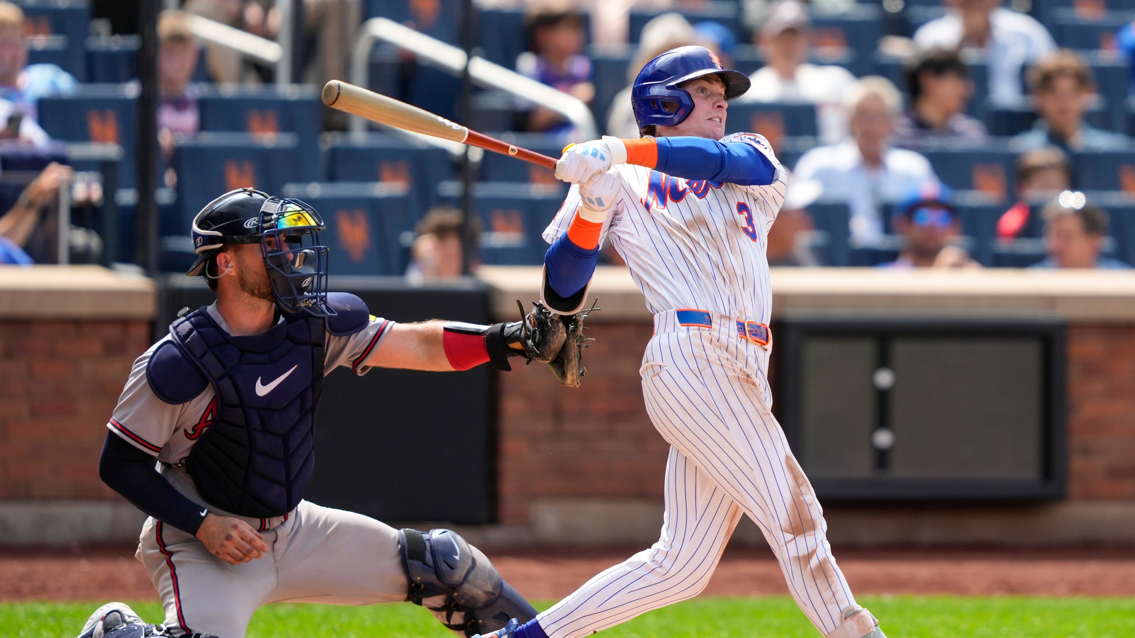 New York Mets' Carson Benge hits an RBI double during the seventh inning in the first baseball game of a doubleheader against the Atlanta Braves, Wednesday, July 29, 2026, in New York. (AP Photo/Yuki Iwamura)