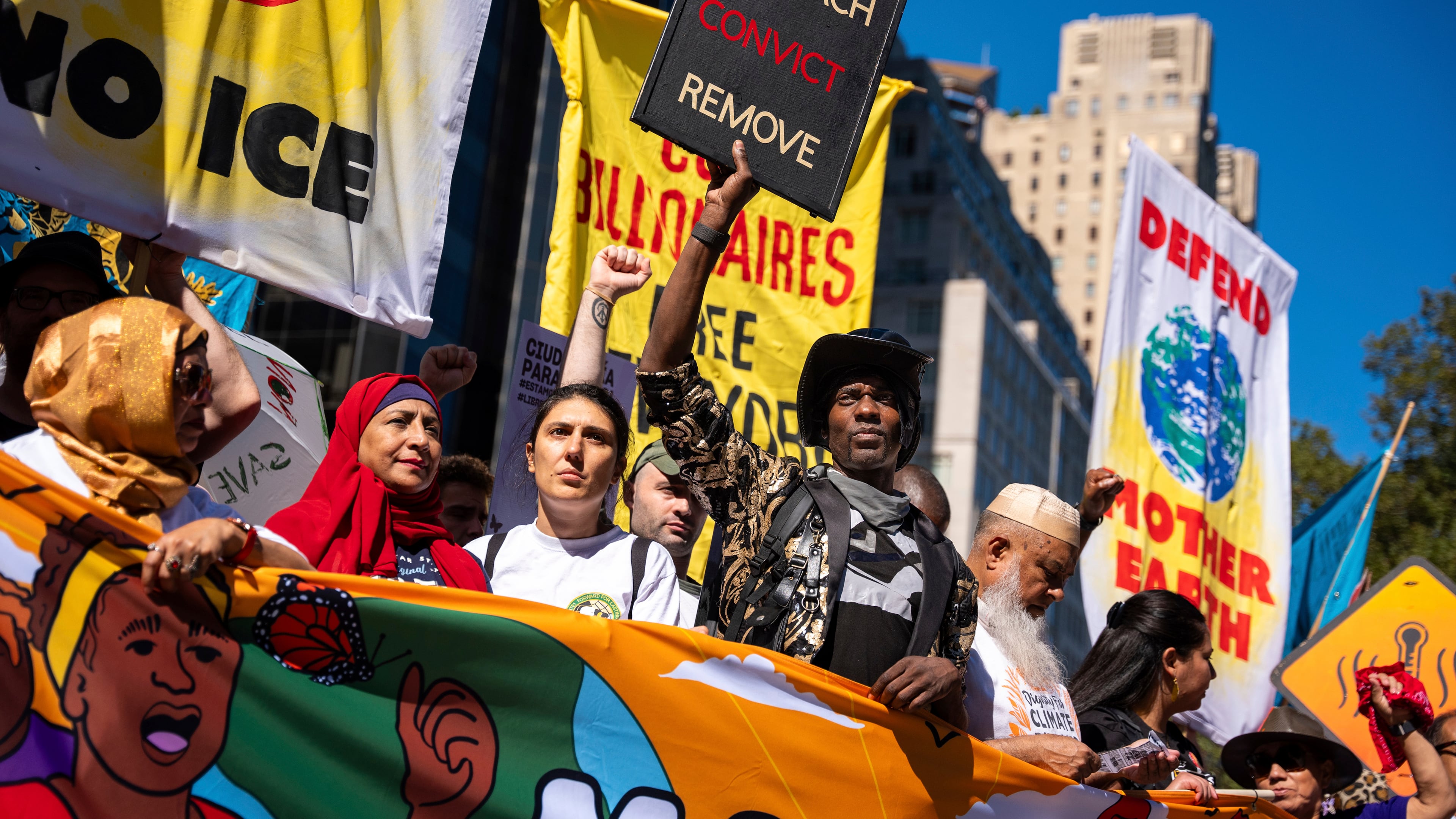 FILE - Protestors march through Manhattan up to Central Park during the "Make Billionaires Pay" climate protest, Sept. 20, 2025, in New York. (AP Photo/Angelina Katsanis, File)