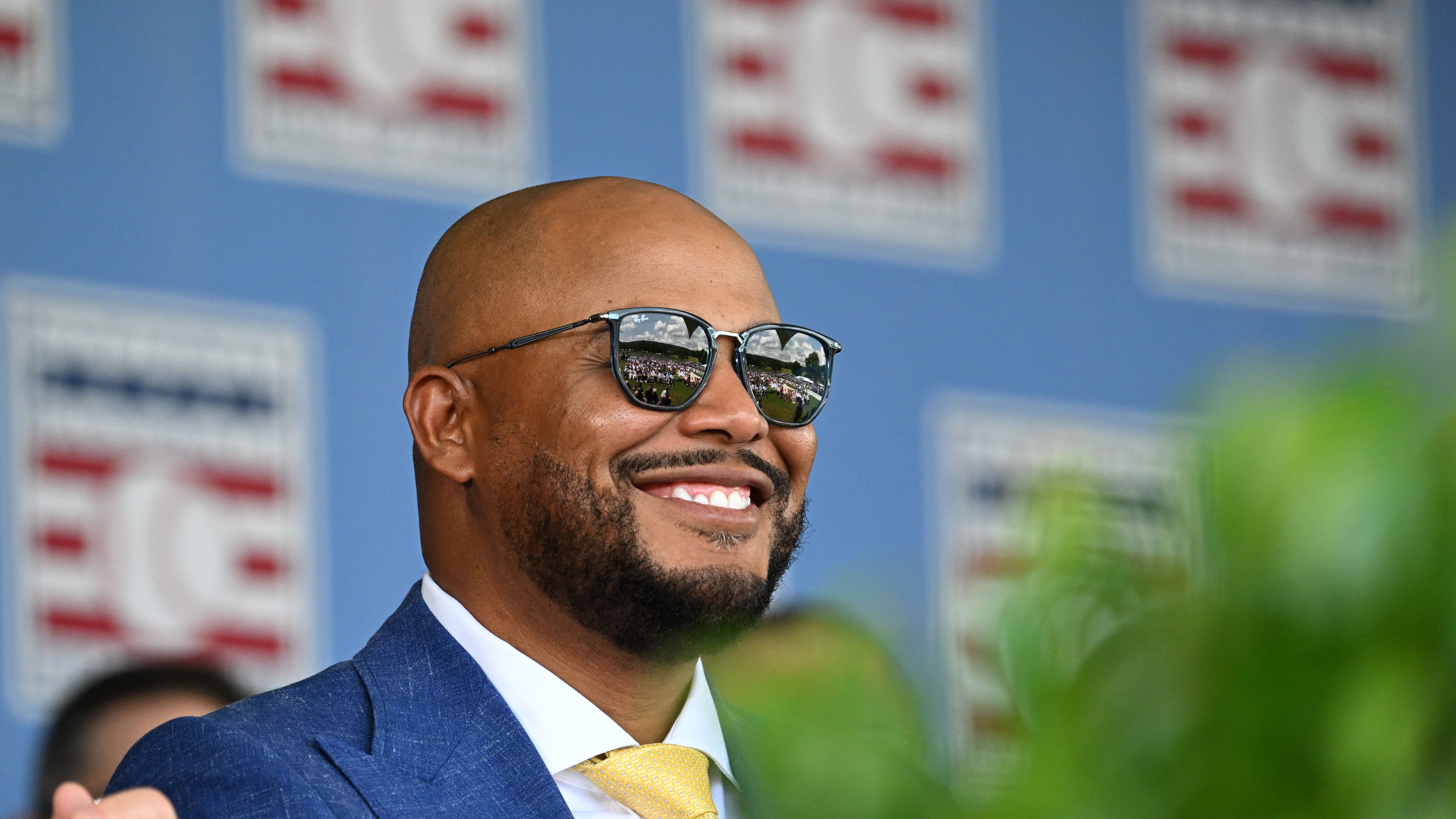 Andruw Jones smiles as he sits with other members of the National Baseball Hall of Fame during the 2026 National Baseball Hall of Fame induction ceremony at the Clark Sports Center on Sunday, July 26, 2026, in Cooperstown, N.Y. (Hyosub Shin/AJC)