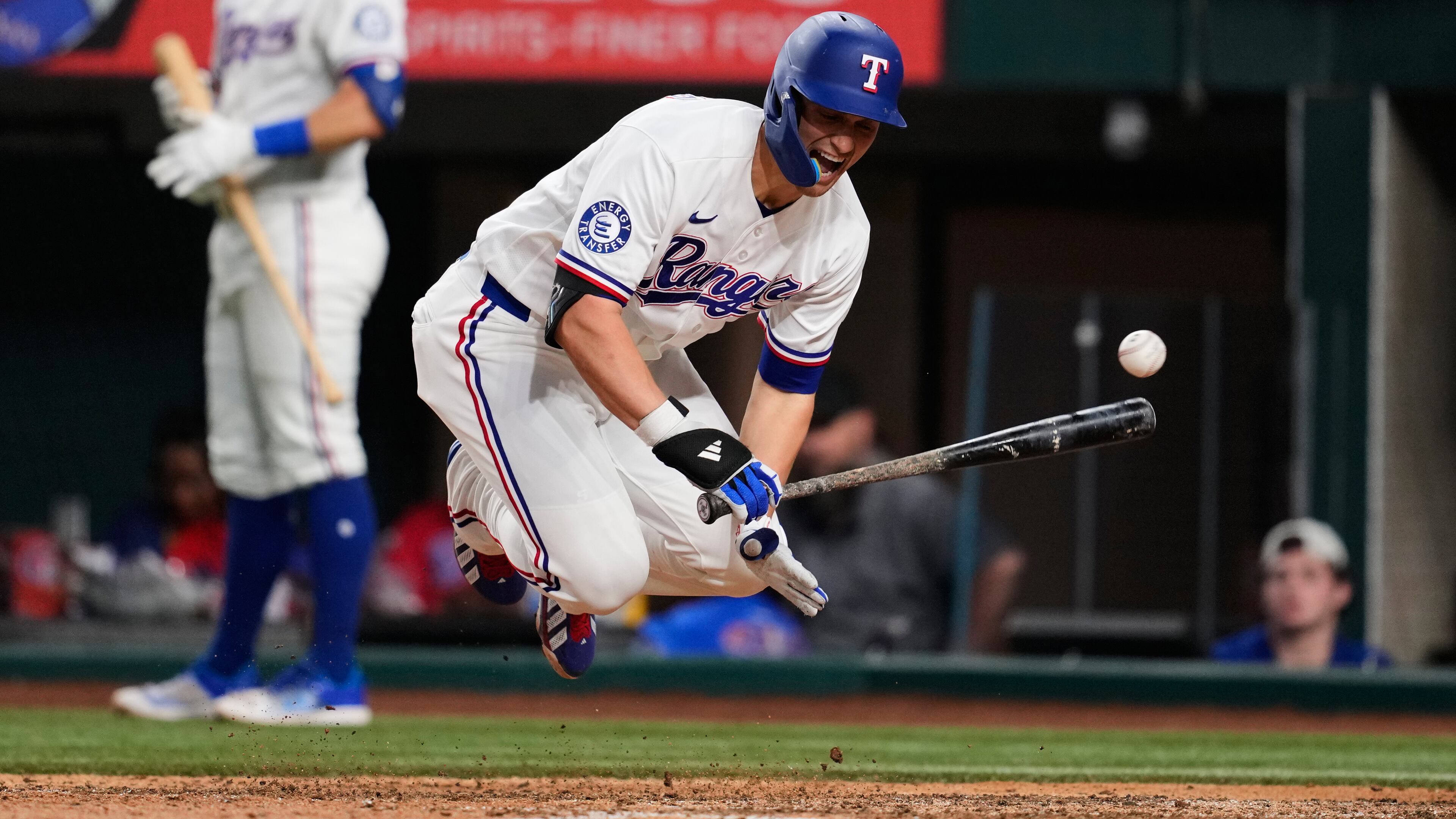 Texas Rangers' Corey Seager reacts to being hit by a pitch in the ninth inning of a baseball game against the Arizona Diamondbacks Monday, May 11, 2026, in Arlington, Texas. (AP Photo/Tony Gutierrez)