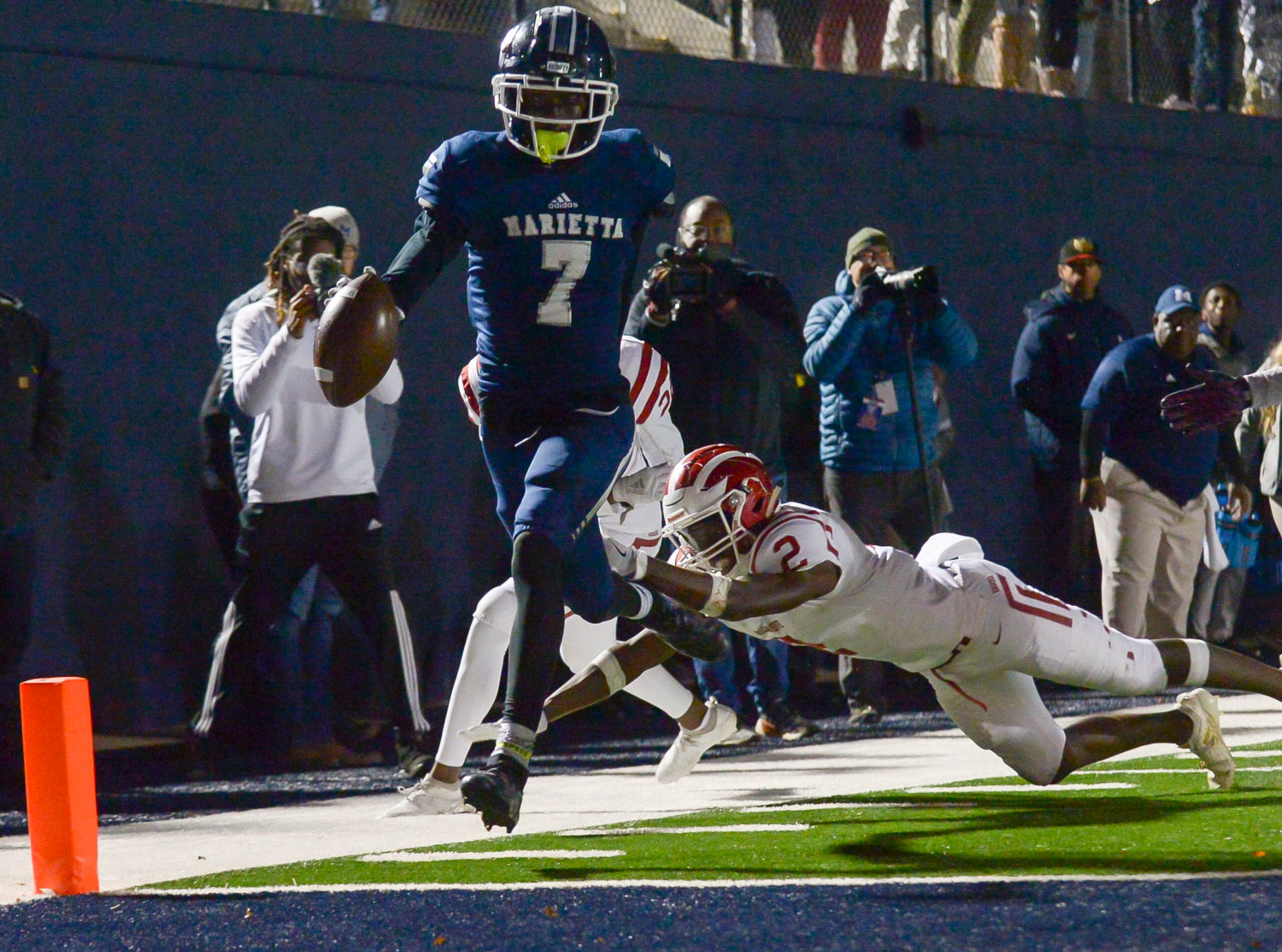 Hillgrove strong safety Andreas Keaton (2) can't stop Marietta wide receiver Ricky White (7) from scoring a touchdown late in the second half of Friday's game at Marietta. (Daniel Varnado/Special)