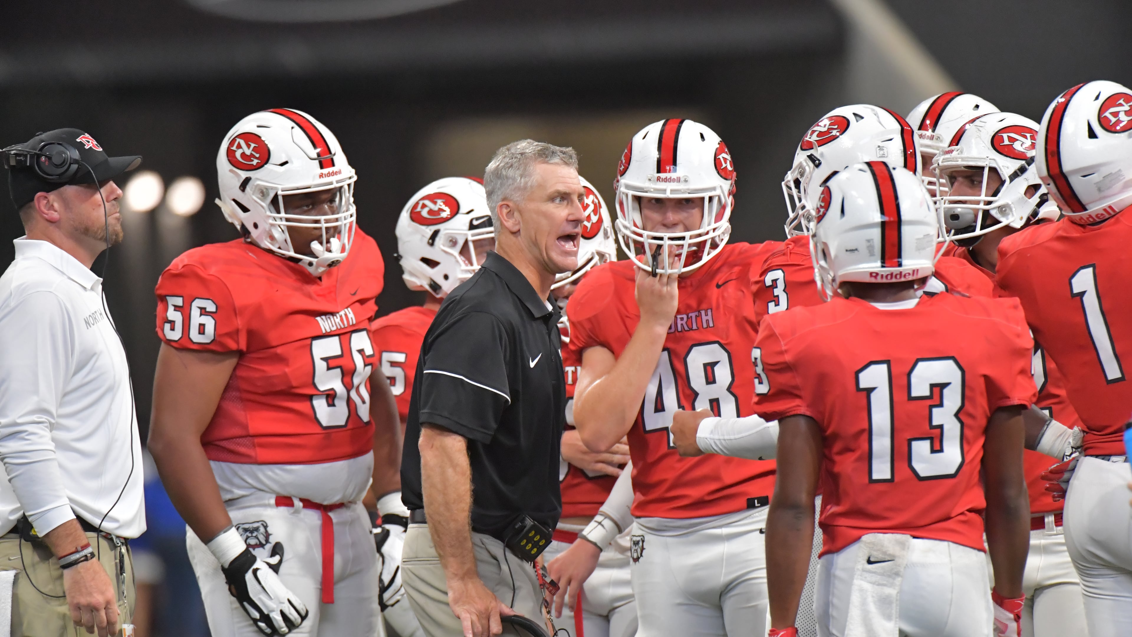 Coach Bill Stewart (center) is best known for his time at North Gwinnett, where his record was 60-19 in six seasons. (Hyosub Shin/AJC 2019)
