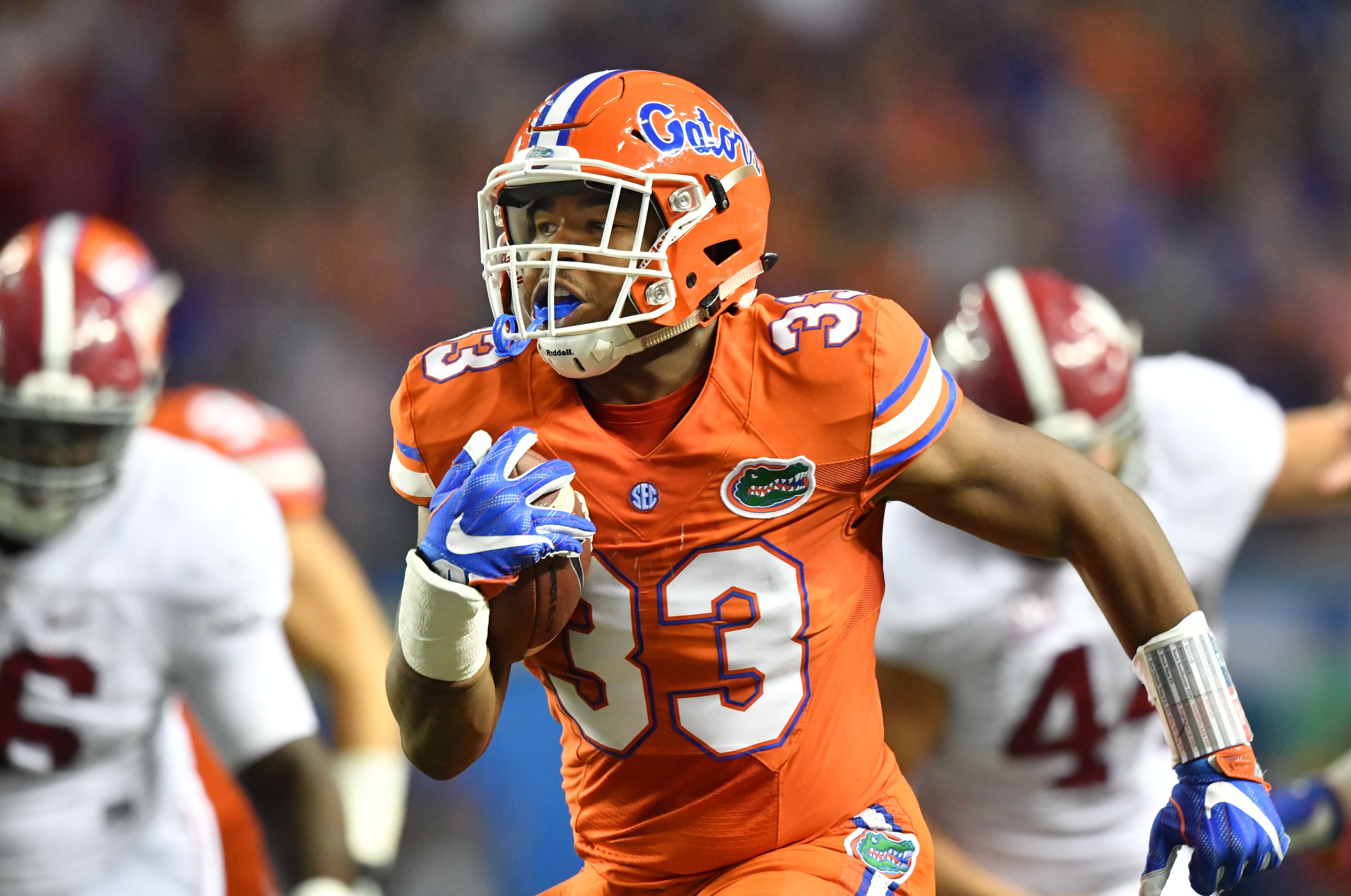 December 3, 2016 Atlanta - Florida running back Tyriek Hopkins (33) runs for a touchdown against the Alabama in the first half of the 2016 SEC Championship at the Georgia Dome on Saturday, December 3, 2016. HYOSUB SHIN / HSHIN@AJC.COM