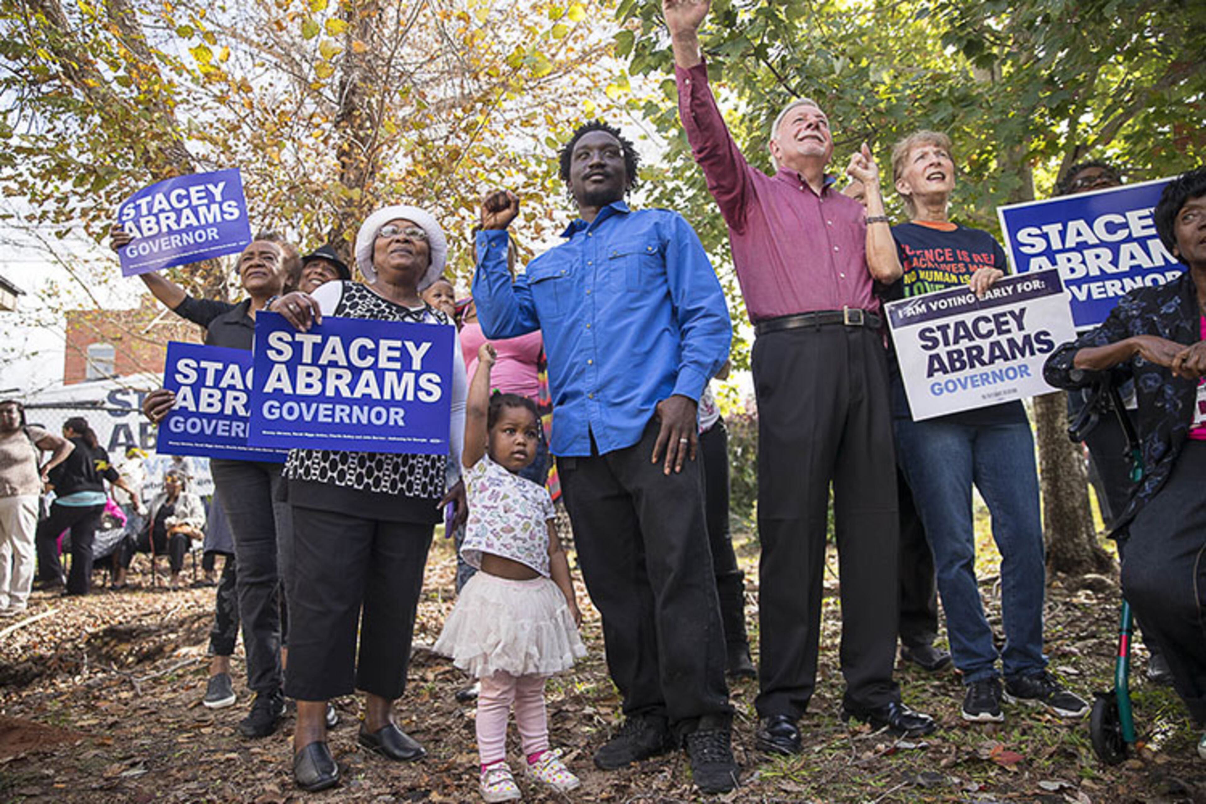11/06/2018 -- Buena Vista, Georgia -- Supporters of Georgia gubernatorial candidate Stacey Abrams scream "Victory" while posing for a photo with Abrams following a campaign stop at Annie D's restaurant on Election Day in Buena Vista, Tuesday, November 6, 2018. (ALYSSA POINTER/ALYSSA.POINTER@AJC.COM)