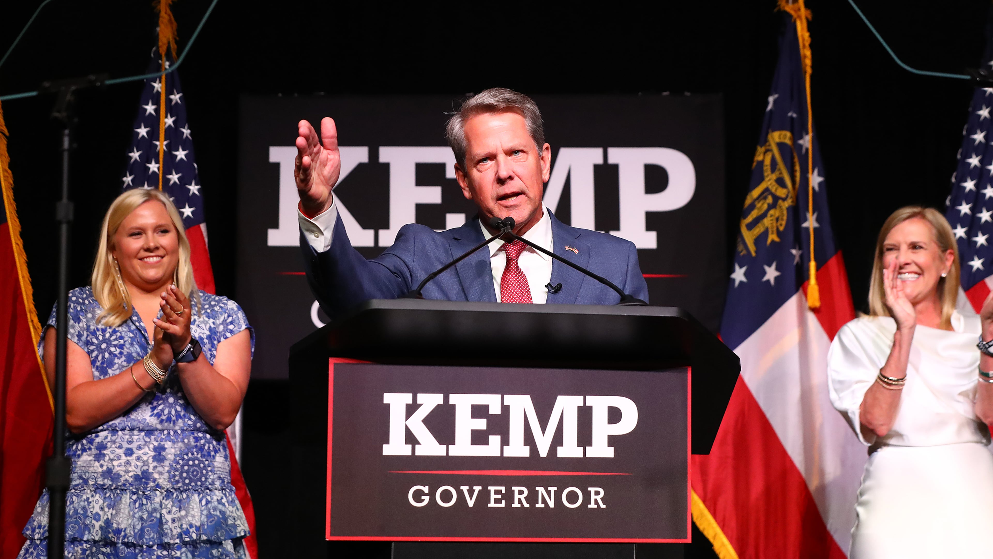 052422 Atlanta: Governor Brian Kemp delivers his election night party speech with First Lady Marty Kemp and his daughter Jarrett standing on stage at the College Football Hall of Fame on Tuesday, May 24, 2022, in Atlanta. “Curtis Compton / Curtis.Compton@ajc.com”