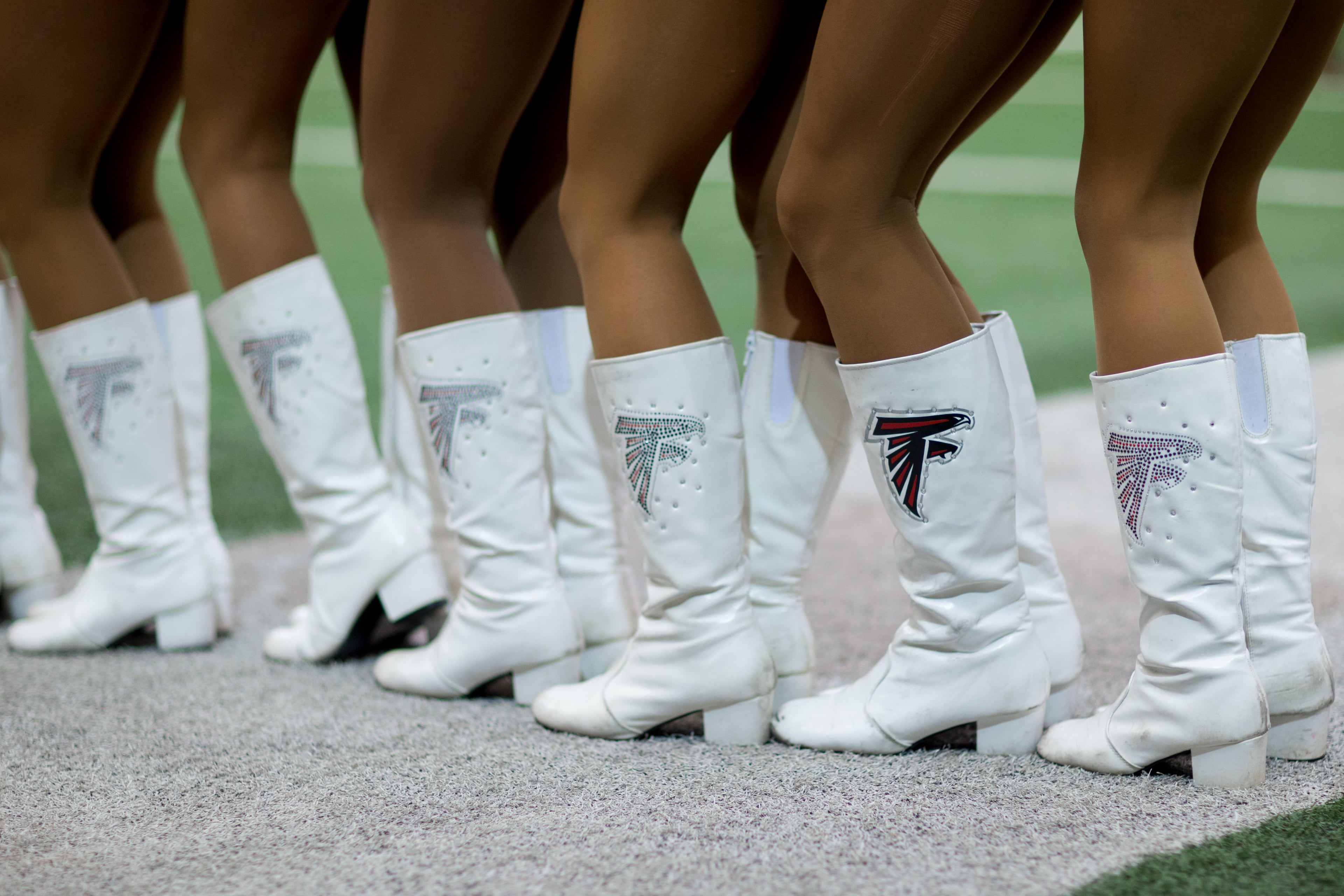 Current Falcons cheerleaders stand on the field before the first cut of tryouts begin for the Atlanta Falcons Cheerleaders at the Georgia Dome, Sunday, April 24, 2016, in Atlanta. A total of 33 advanced to the finals, which will be held on Wednesday at Terminal West. BRANDEN CAMP/SPECIAL
