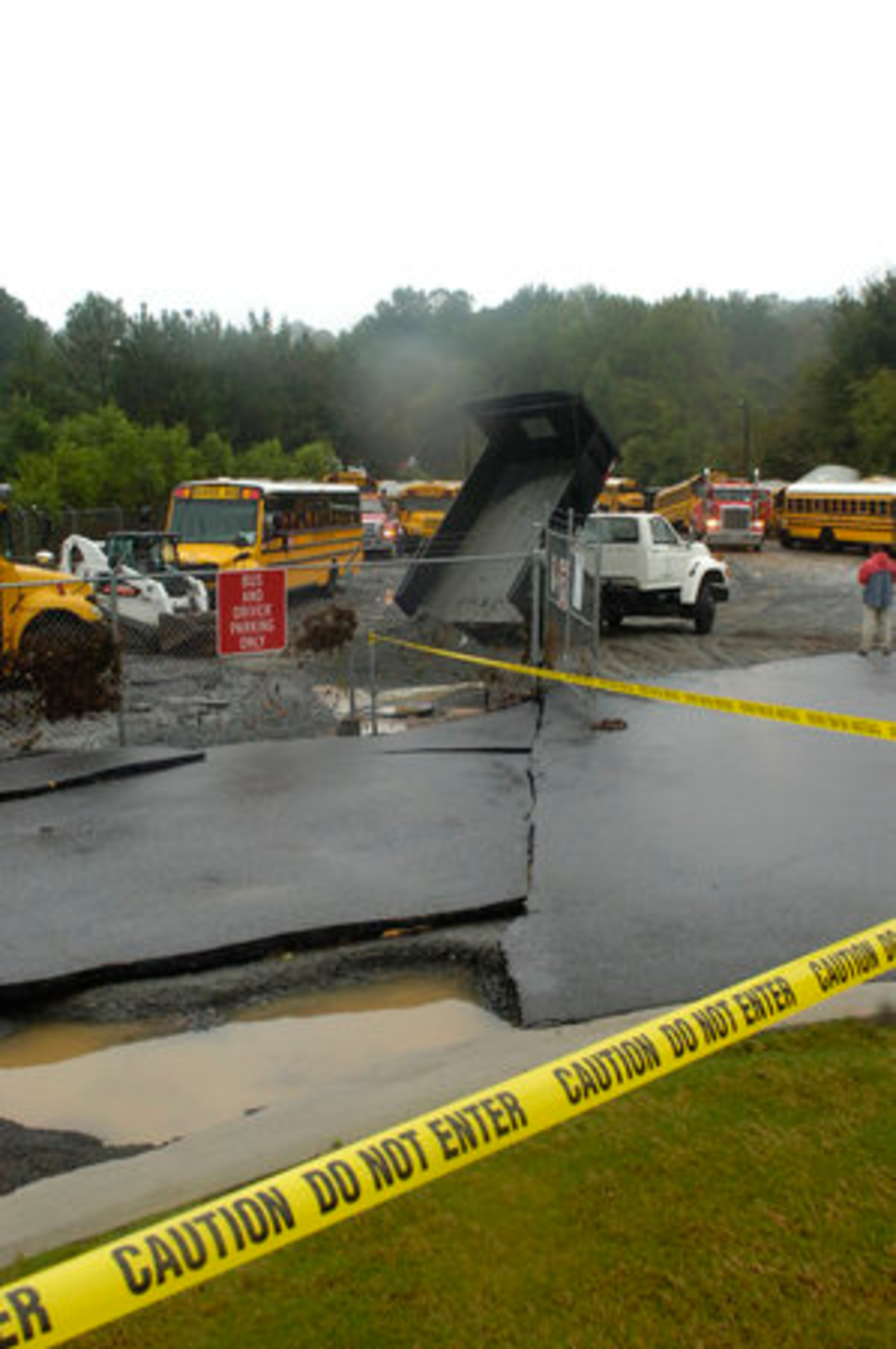 Roadways at the bus lot sustained heavy damage in Lilburn near Parkview High School.