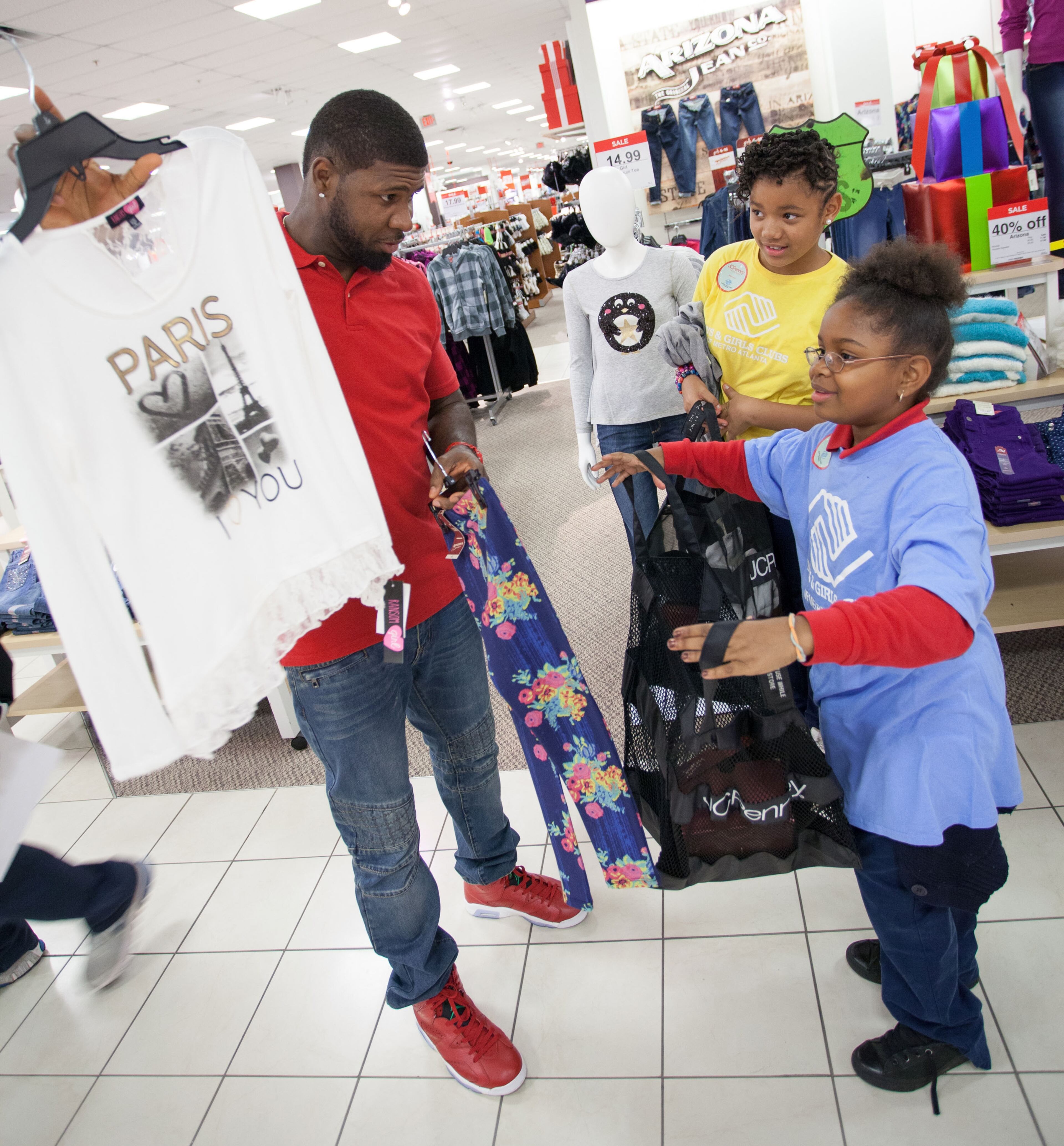 Atlanta Falcon Devin Hester surprises the Boys & Girls Club of Metro Atlanta with a holiday shopping spree for #GivingTuesday at JCPenney in Fayetteville, Georgia. (Photo by Marcus Ingram/Getty Images for JCPenney)