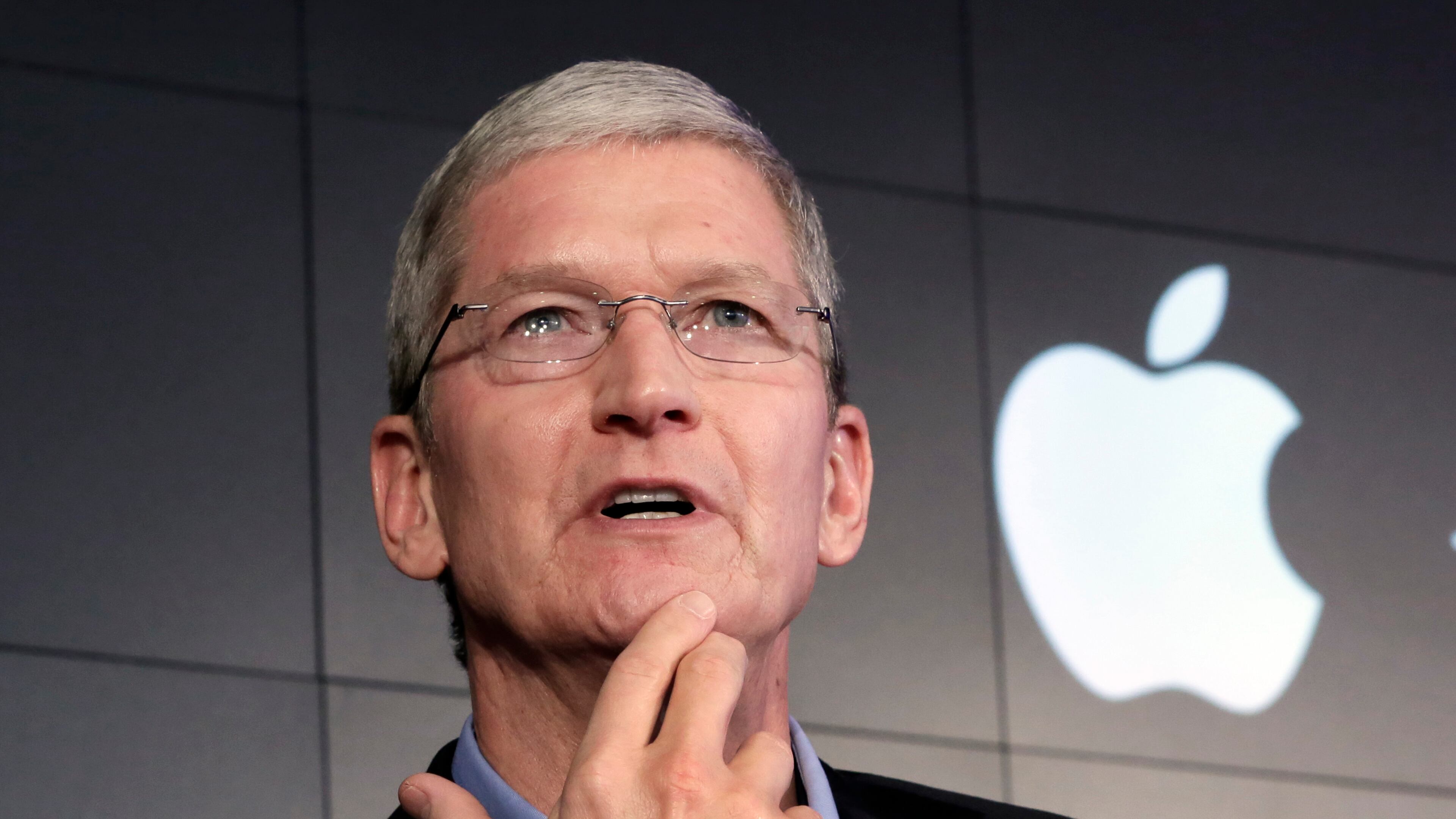 Apple CEO Tim Cook, perhaps wondering how to talk some tax sense into Hillary Clinton and other liberals. (AP file photo)