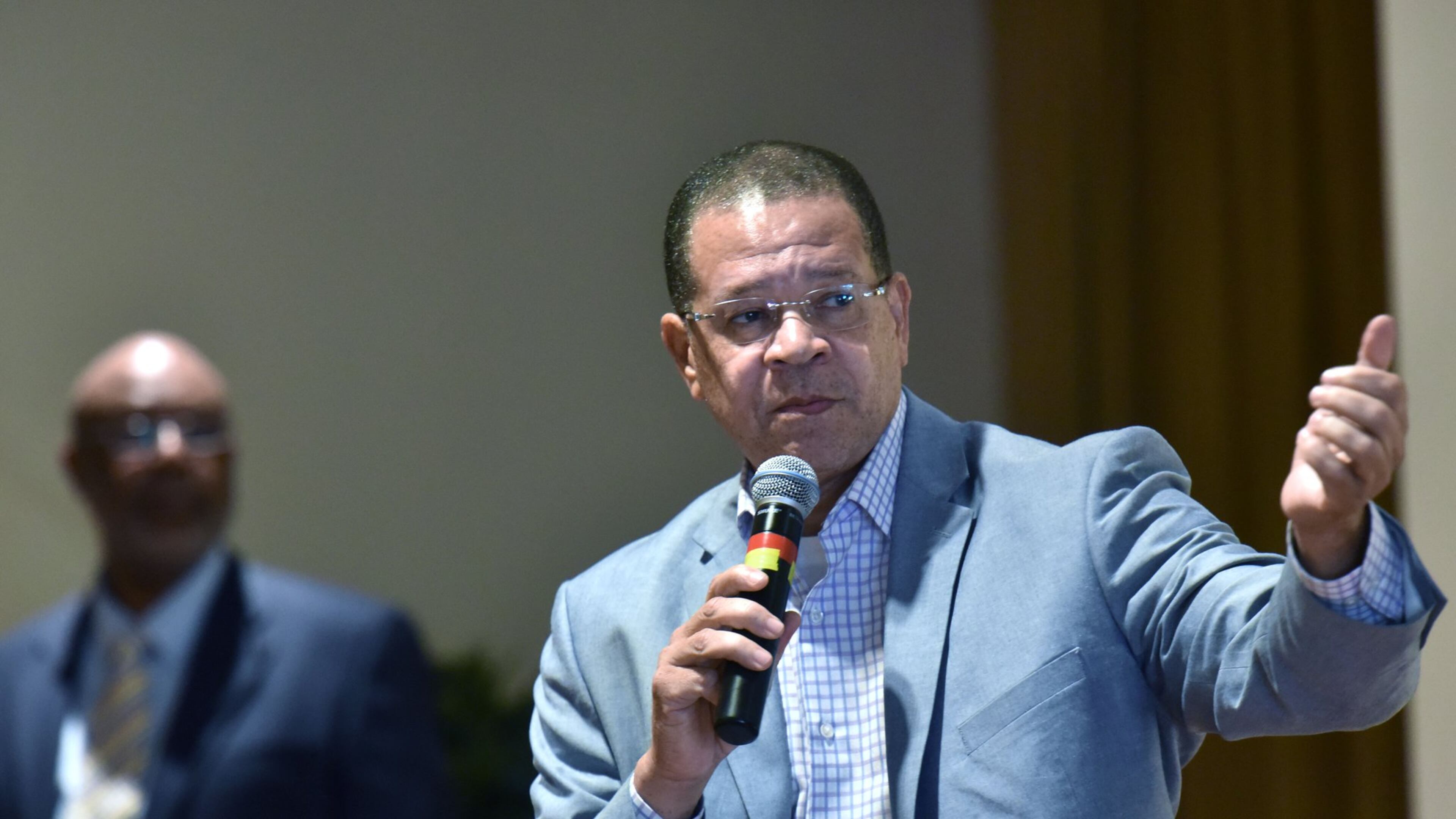 Fulton County Commission Chairman John Eaves speaks as Dwight Robinson (left), chef appraiser, stands before Fulton County residents during Emergency Town Hall Meeting to discuss about Property Tax Assessments hosted by Fulton County Office of Chairman John Eaves at Harriett G. Darnell Senior Multipurpose Facility on Tuesday, June 13, 2017. HYOSUB SHIN / HSHIN@AJC.COM AJC FILE PHOTO