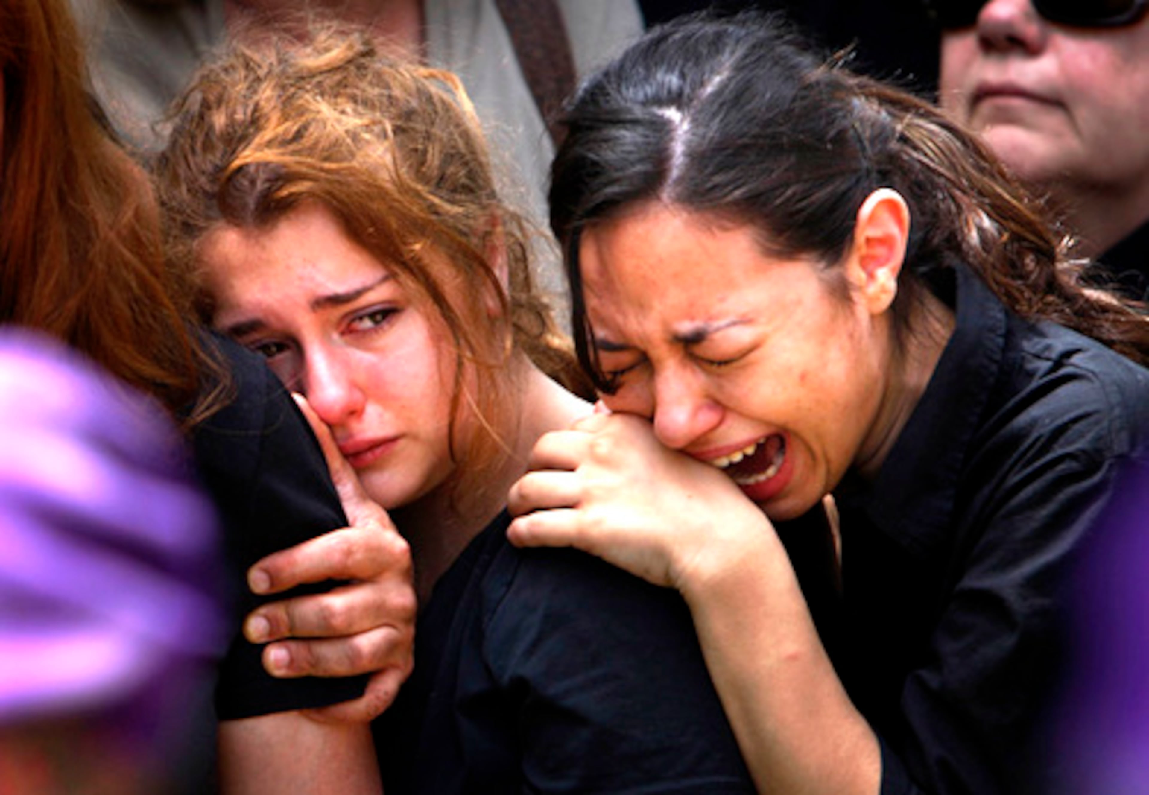 Relatives of Israeli soldier Sgt. David Papian grieve at his funeral at the Mount Herzl military cemetery in Jerusalem on Friday. Papian was one of three soldiers killed in fighting with Palestinian militants in the Gaza Strip earlier in the week.