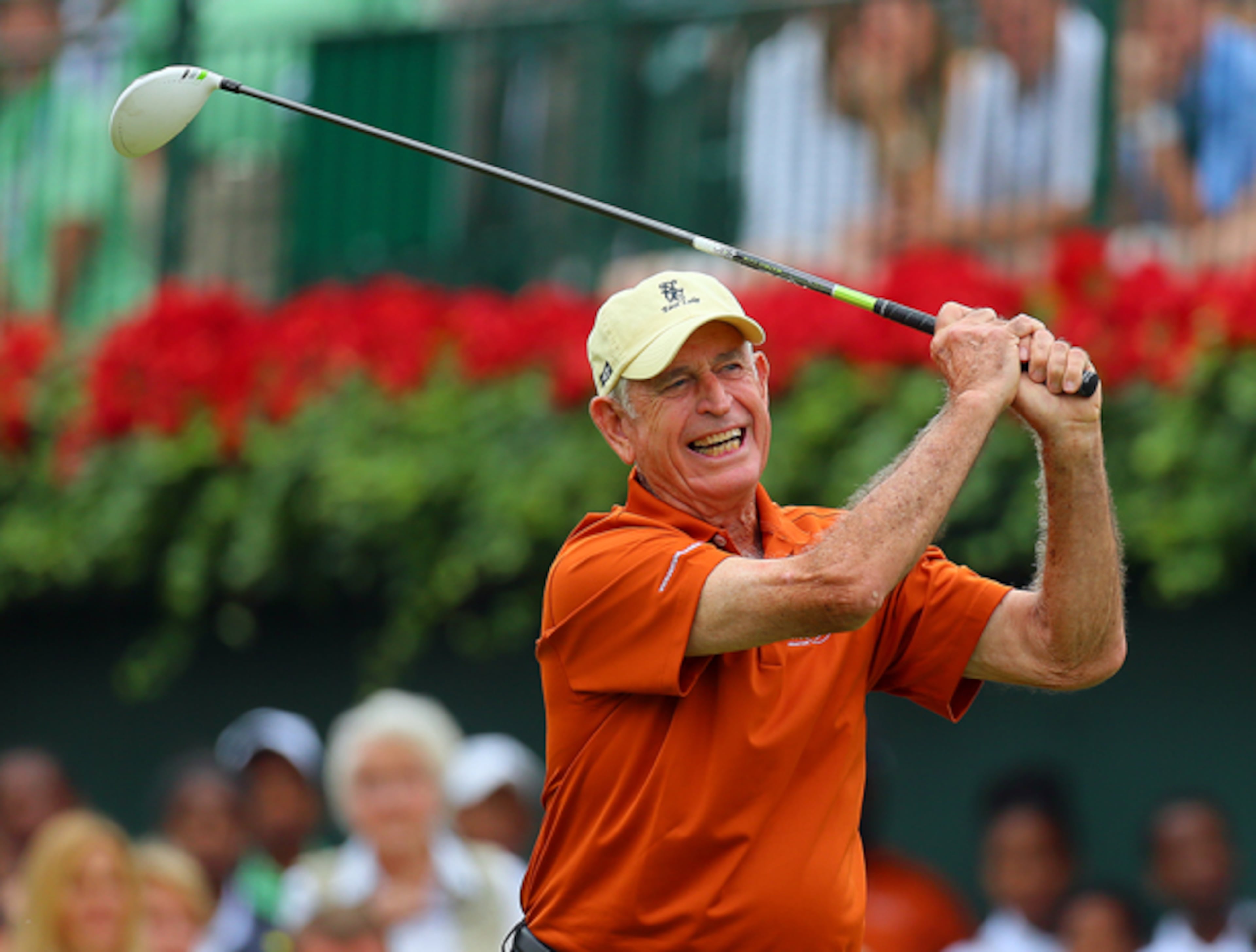 Charles Harrison, then in his 80s, hits the ceremonial first shot in a tournament at East Lake Golf Club a decade ago. (Curtis Compton/AJC)