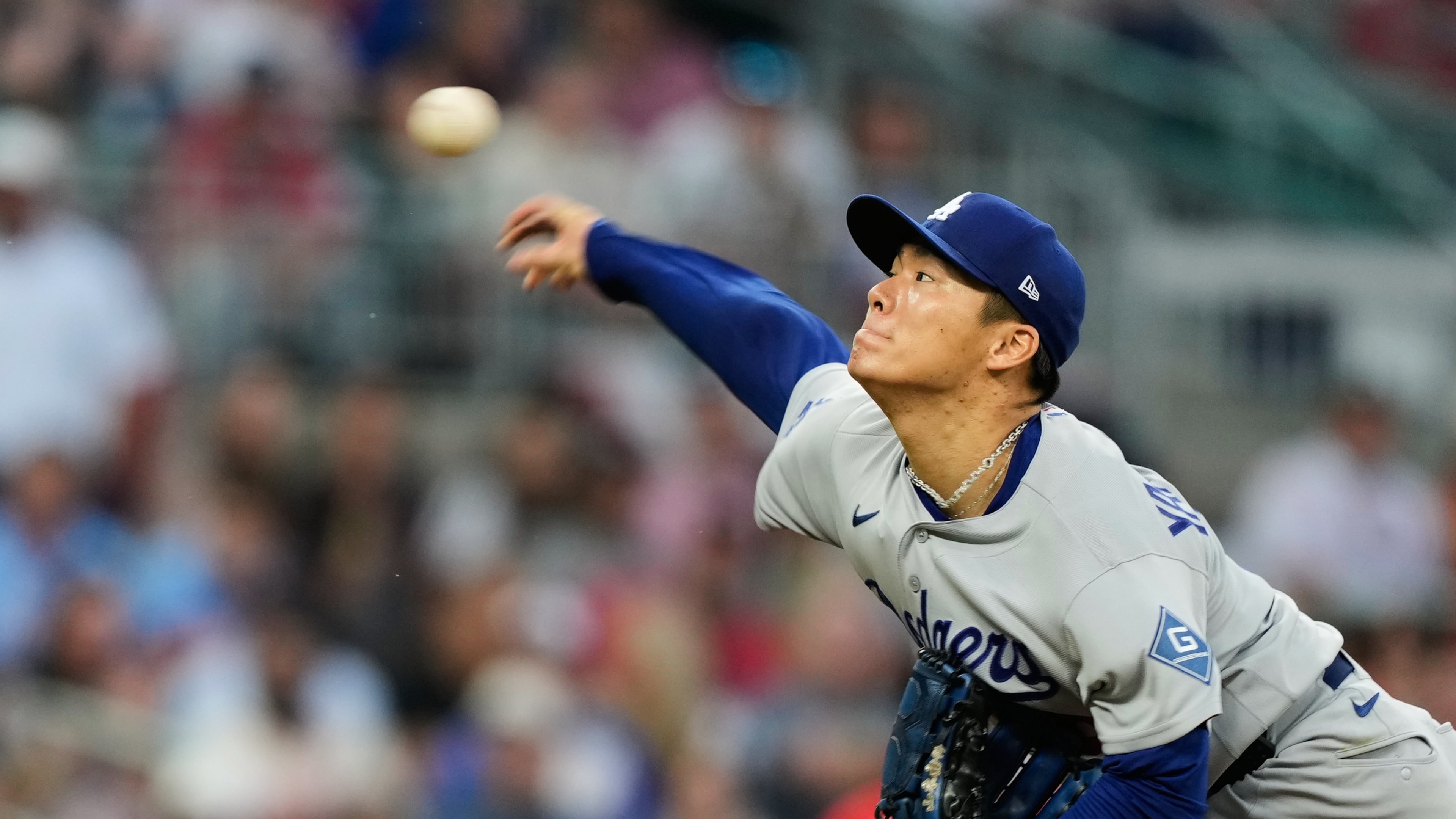 Los Angeles Dodgers' Yoshinobu Yamamoto throws to the Atlanta Braves during the third inning in Game 3 of baseball's National League Division Series, Tuesday, Oct. 6, 2026, in Atlanta. (AP Photo/Brynn Anderson)
