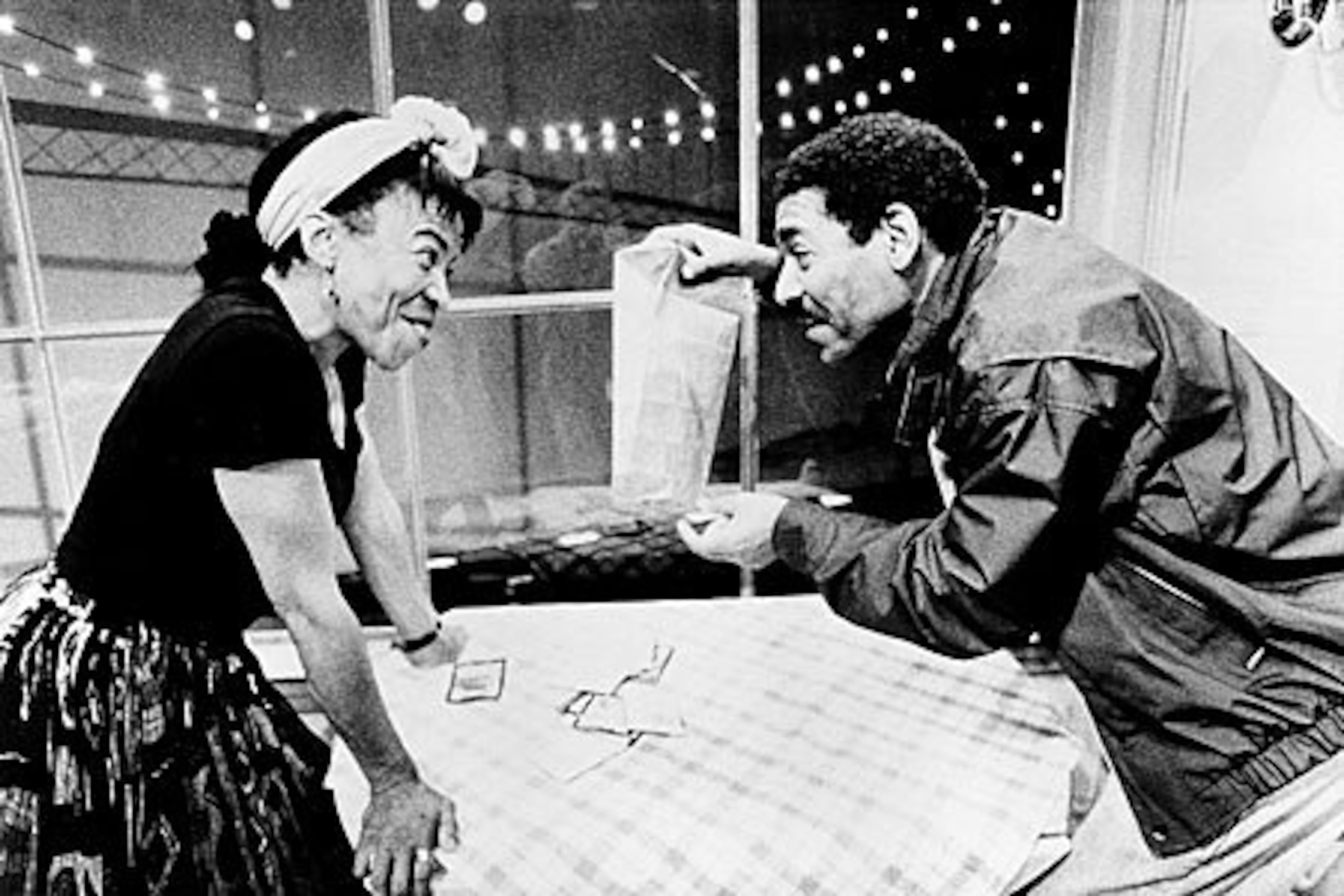 May Thompson (Carol Mitchell-Leon) talks about her future with her husband, Charlie (Terry Alexander) in 'Bourbon At The Border.' which was written by Pearl Cleage and directed by Kenny Leon.