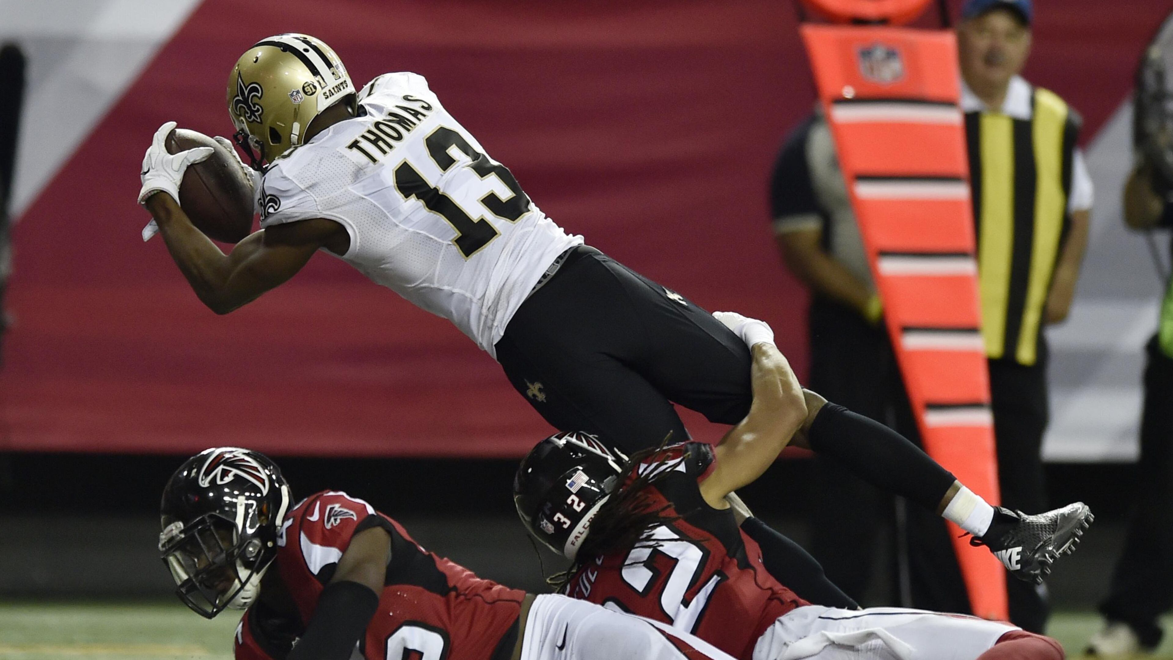 January 1, 2017, Atlanta - Saints wide receiver Michael Thomas (13) jumps into the end zone during the NFL football game against the Saints in Atlanta, Georgia, on Sunday, January 1, 2017. (DAVID BARNES / DAVID.BARNES@AJC.COM)