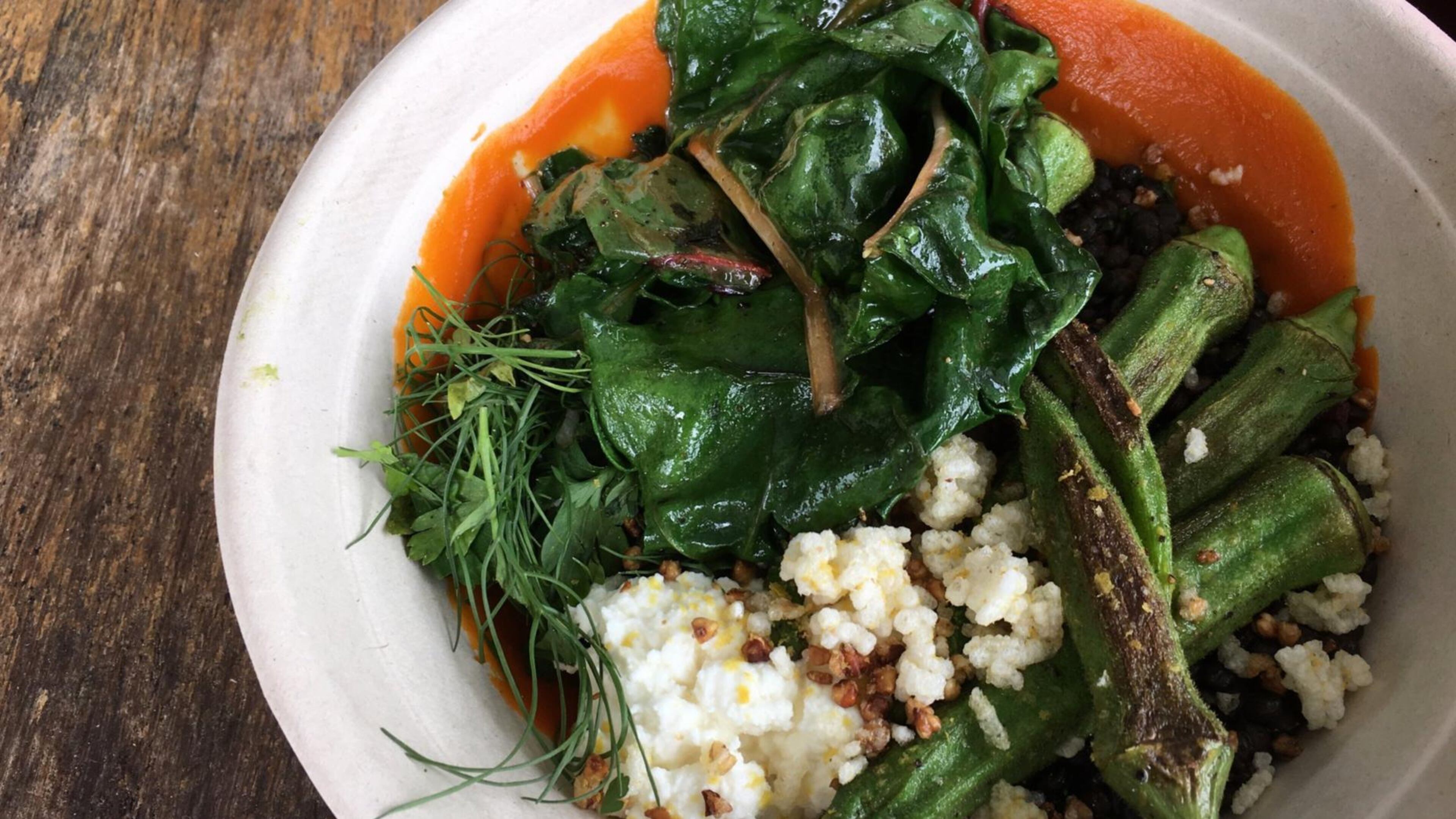 The Casablanca bowl at Recess is a far-out combination of crispy rice, lentils, Swiss chard, seared okra, and Moroccan spiced carrot puree. CONTRIBUTED BY WYATT WILLIAMS