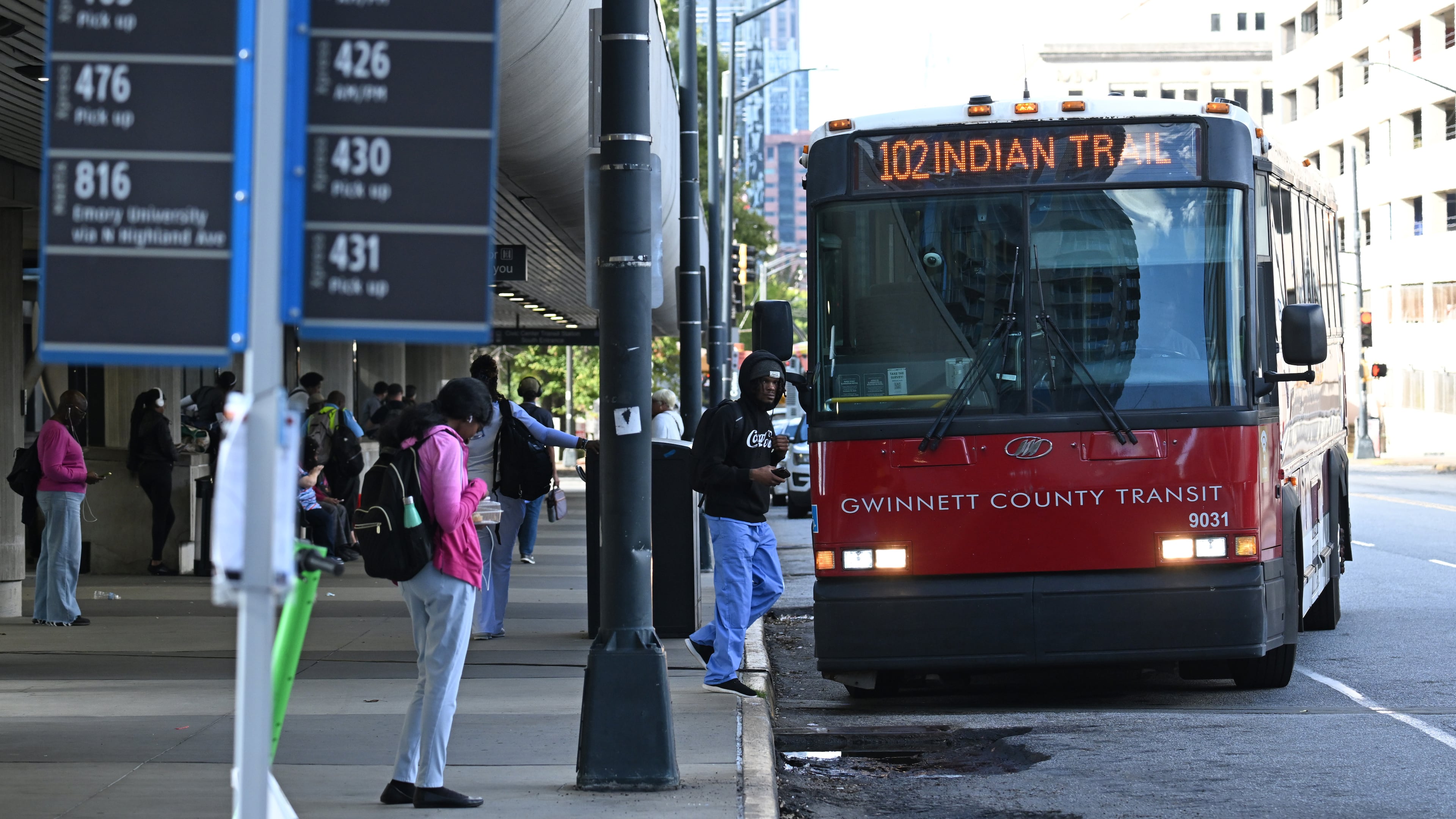 A Gwinnett County Transit bus arrives at the Civic Center MARTA station in Atlanta in 2024. (Hyosub Shin/AJC)