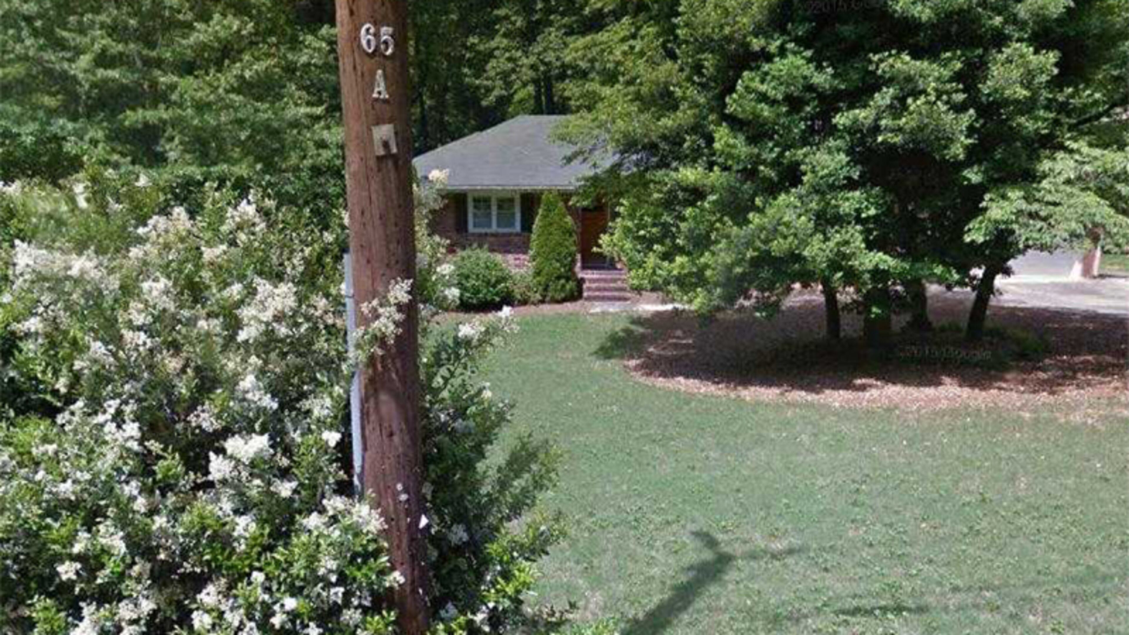 Sandy Springs is spending $400,000 to buy this house at 6018 Kayron Drive for the eventual widening of Hammond Drive. Courtesy of the City of Sandy Springs