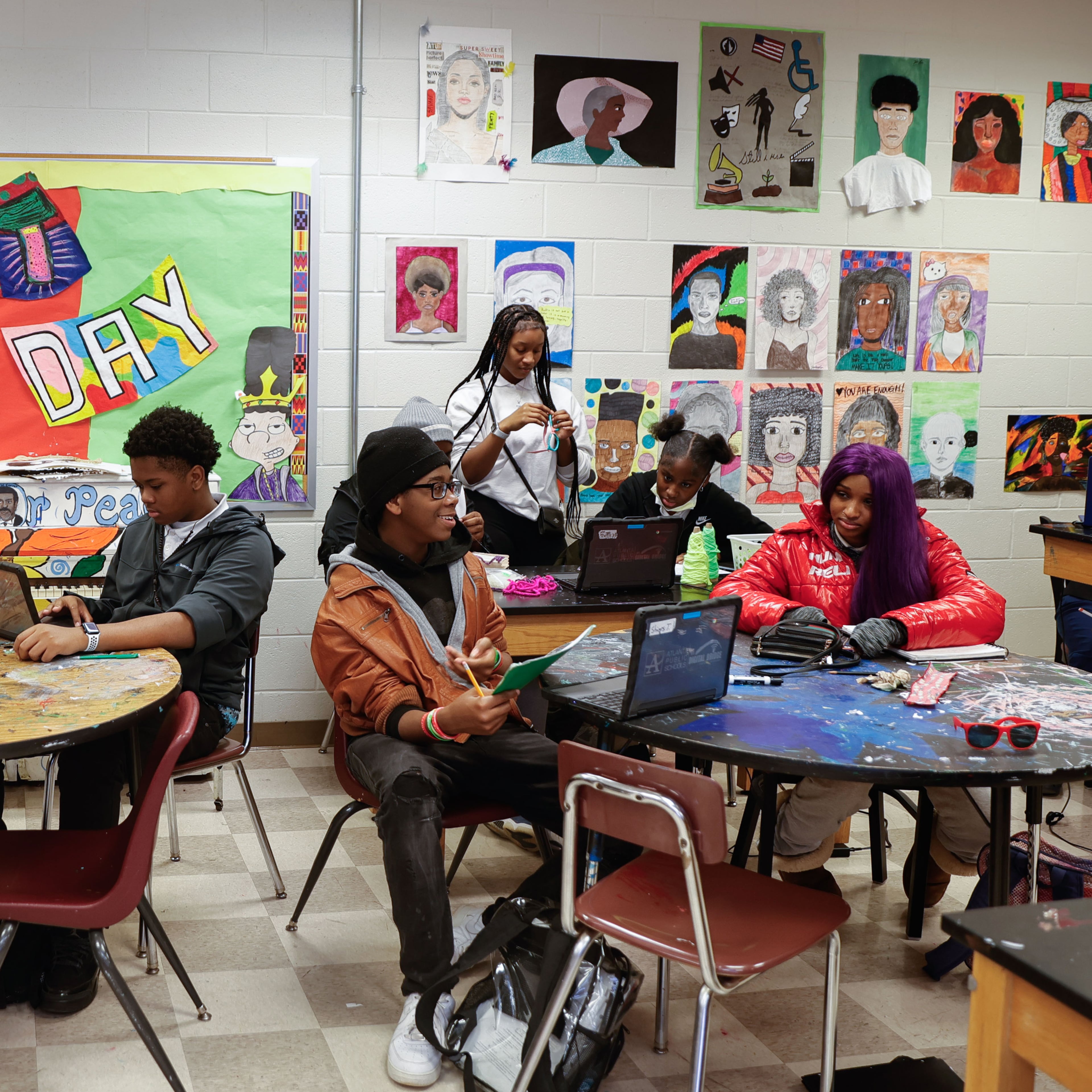 Students at Carver Early College School of Technology attend the school’s art class on Wednesday, Dec. 10, 2025. Atlanta Public Schools plans to convert the campus to a school of the arts that will serve grades 6-12. The plan depends on voters extending a one-cent sales tax for education. (Natrice Miller/AJC)