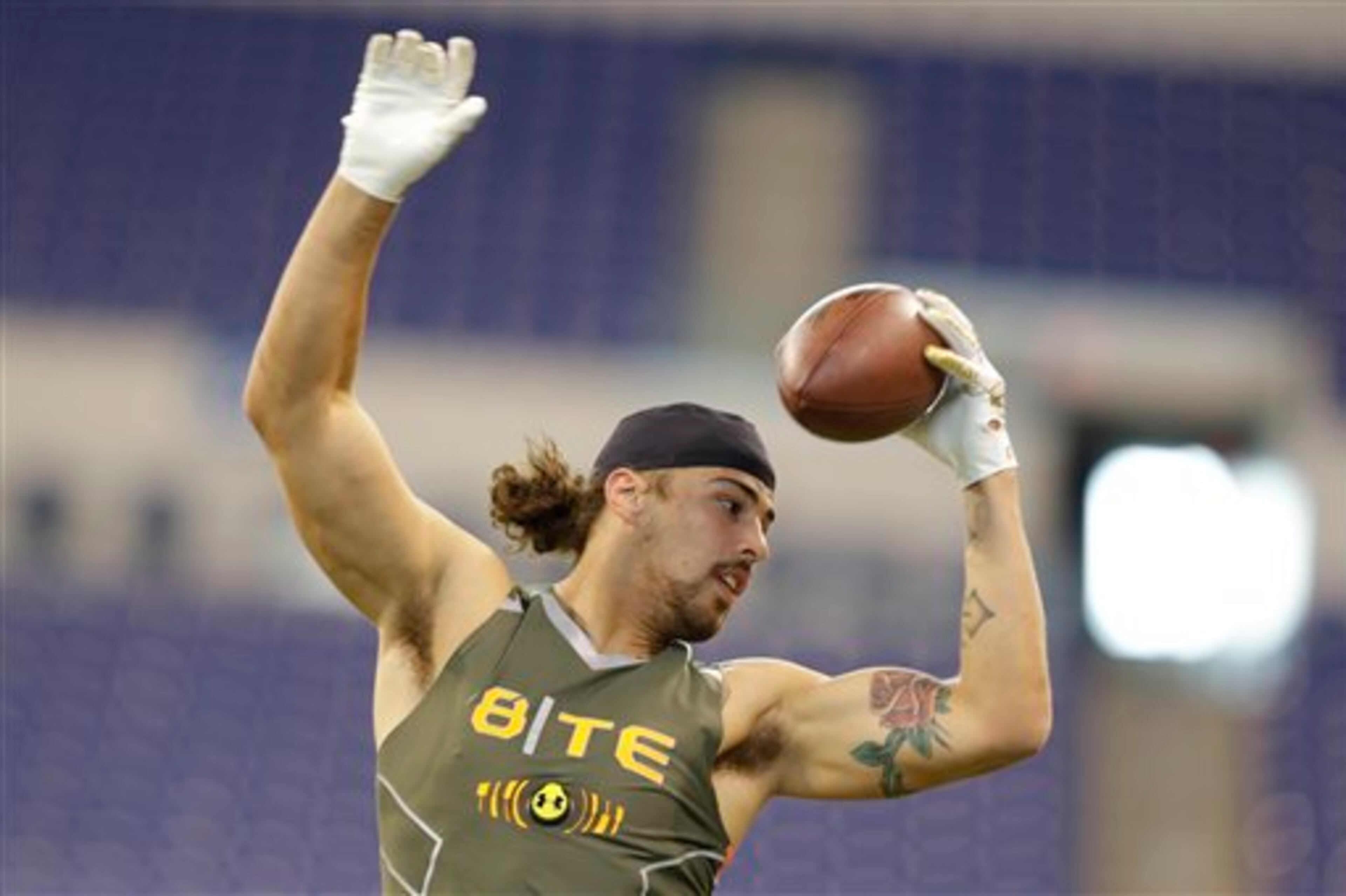 Colorado State tight end Crockett Gillmore runs a drill at the NFL football scouting combine in Indianapolis, Saturday, Feb. 22, 2014. (AP Photo/Michael Conroy)