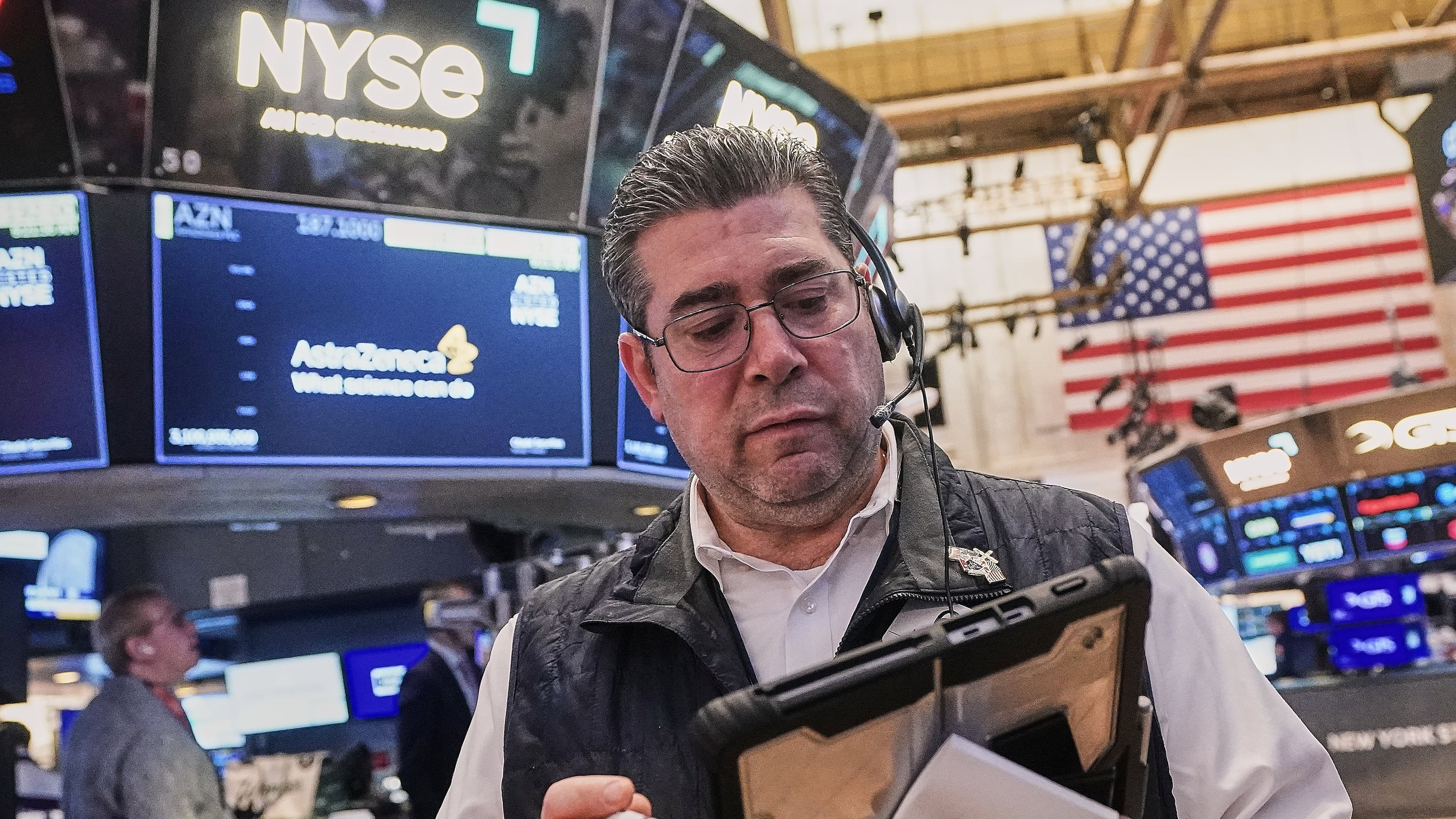 FILE - Trader Michael Capolino works on the floor of the New York Stock Exchange, Monday, Feb. 2, 2026. (AP Photo/Richard Drew, File)