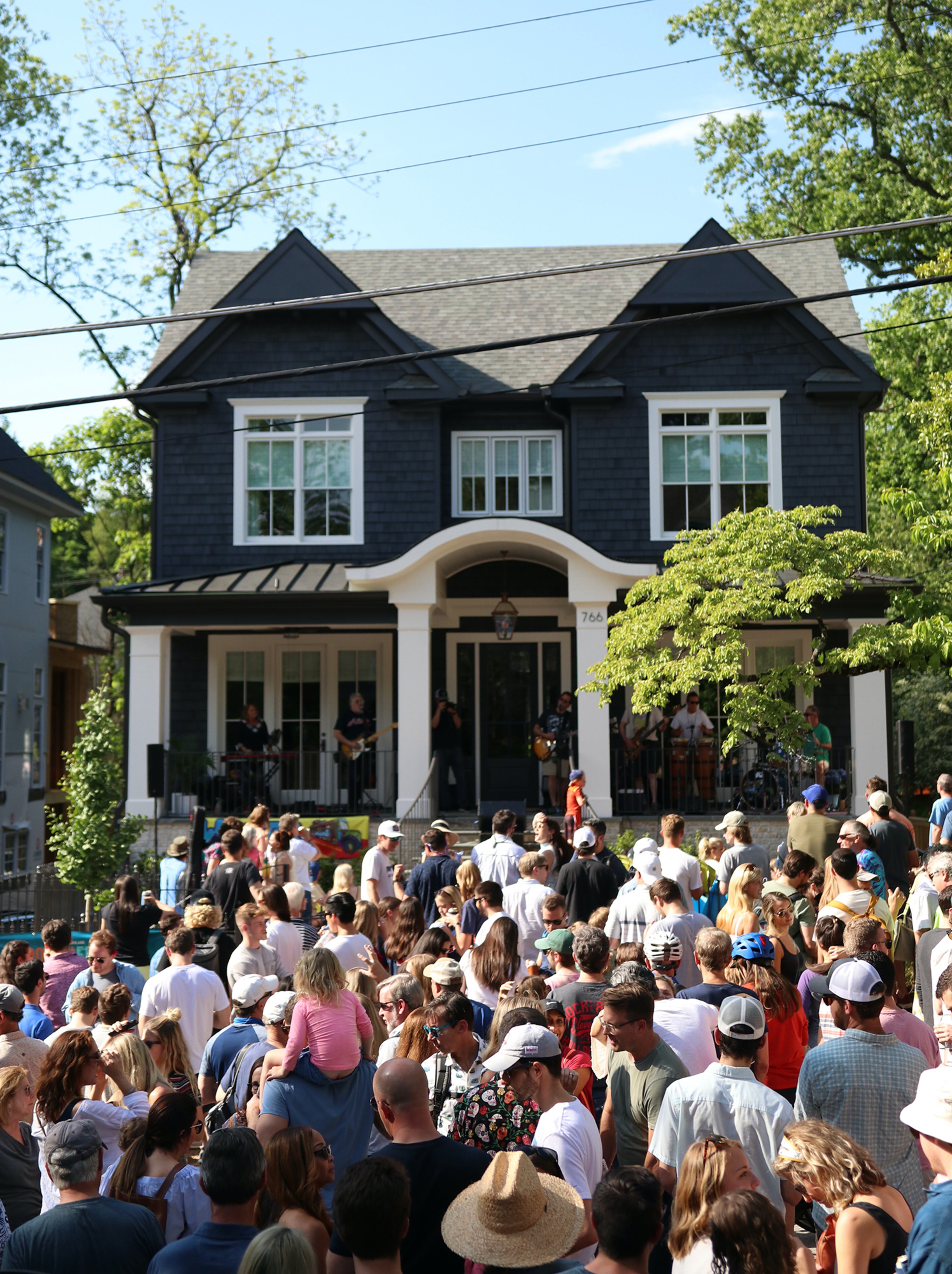 Neighbors listen to Webster Band Atlanta during the Virginia Highland Porchfest.
Courtesy David Goo