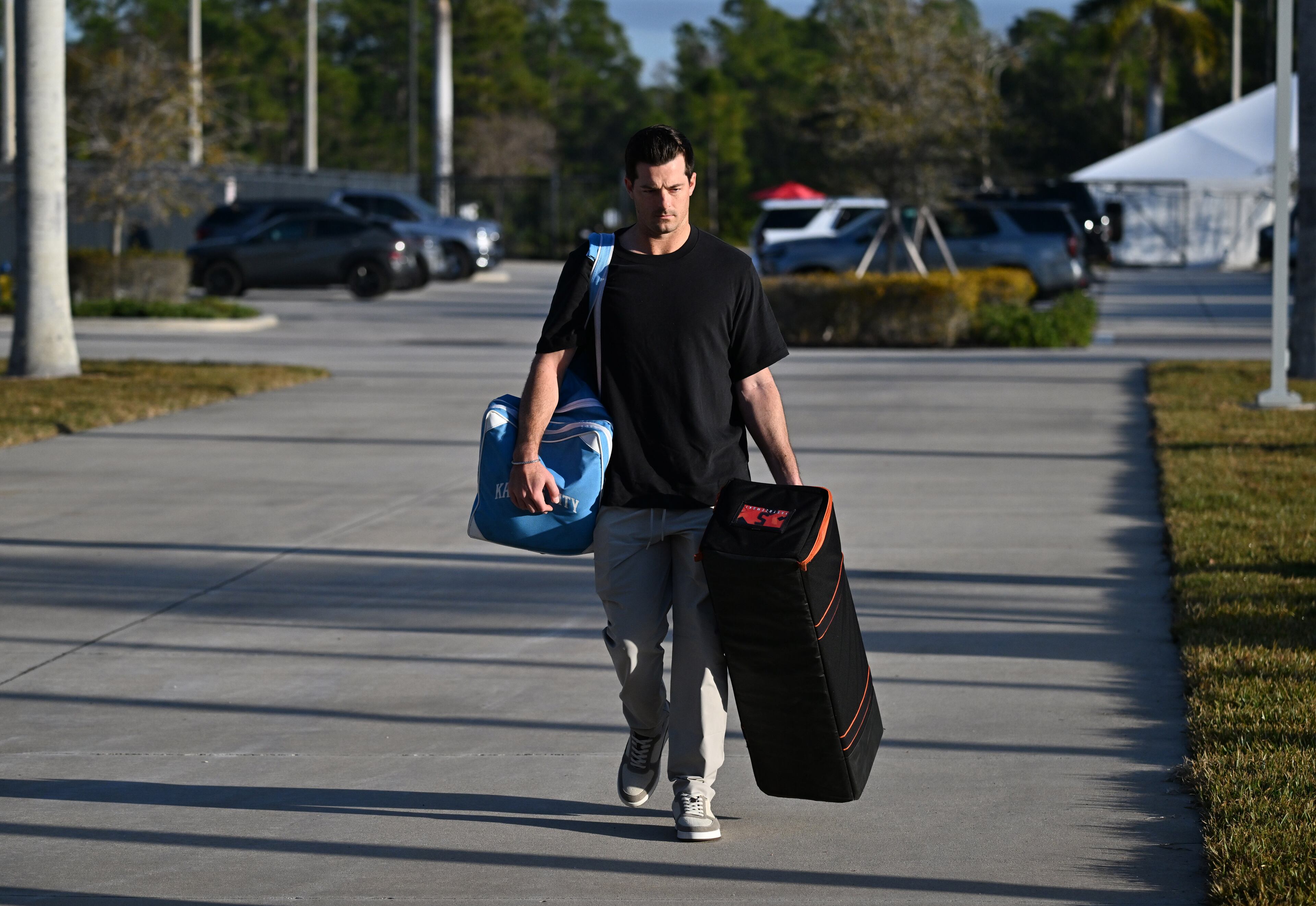 Braves outfielder Mike Yastrzemski arrives before spring training workouts Wednesday, Feb. 11, 2026, at CoolToday Park in North Port, Fla. (Hyosub Shin/AJC)