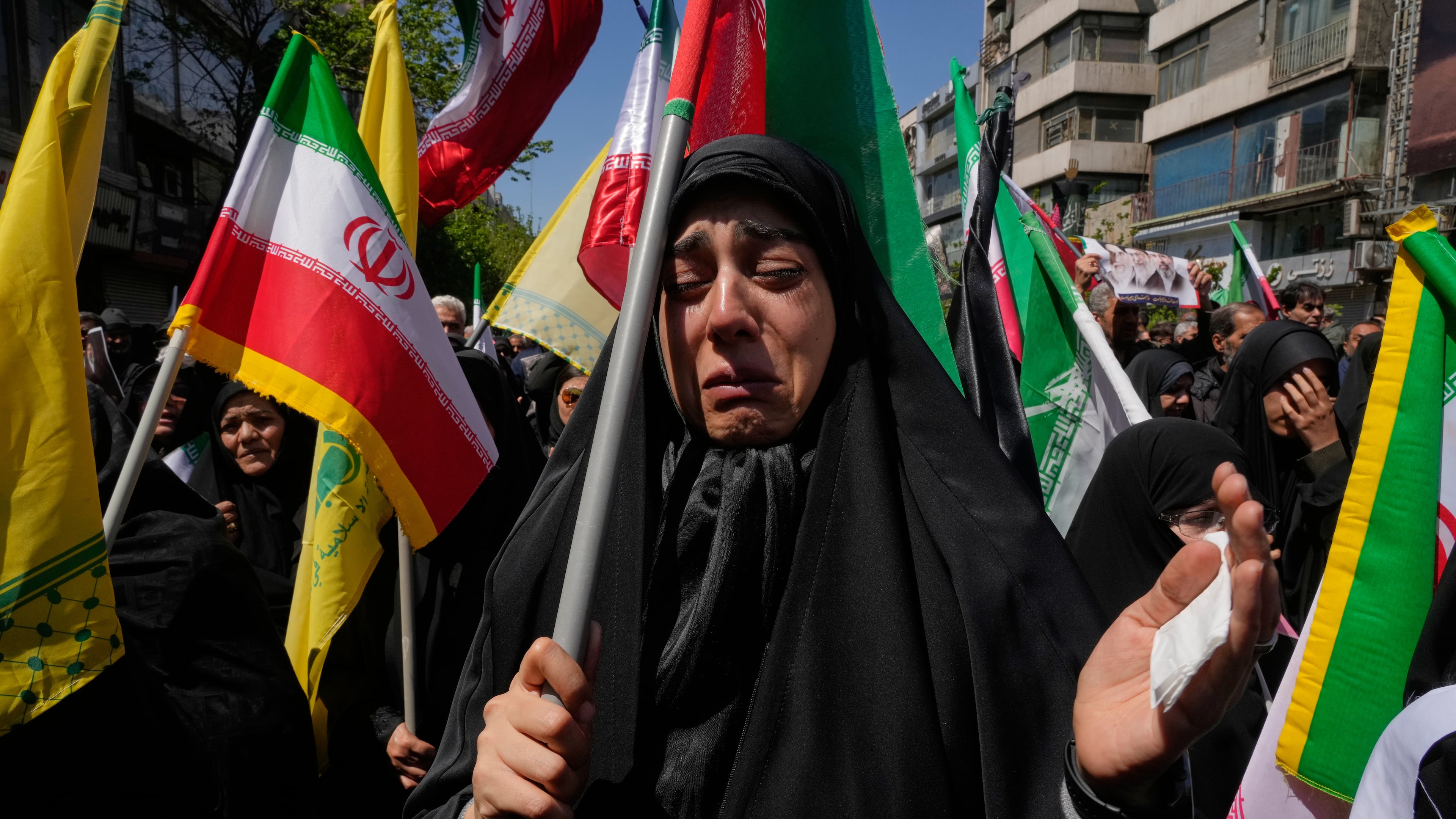 A government supporter weeps during a mourning ceremony marking the 40th day since the death of Iranian Supreme Leader Ayatollah Ali Khamenei, who was killed in the U.S. and Israel strikes in Tehran, Iran, Thursday, April 9, 2026. (AP Photo/Vahid Salemi)