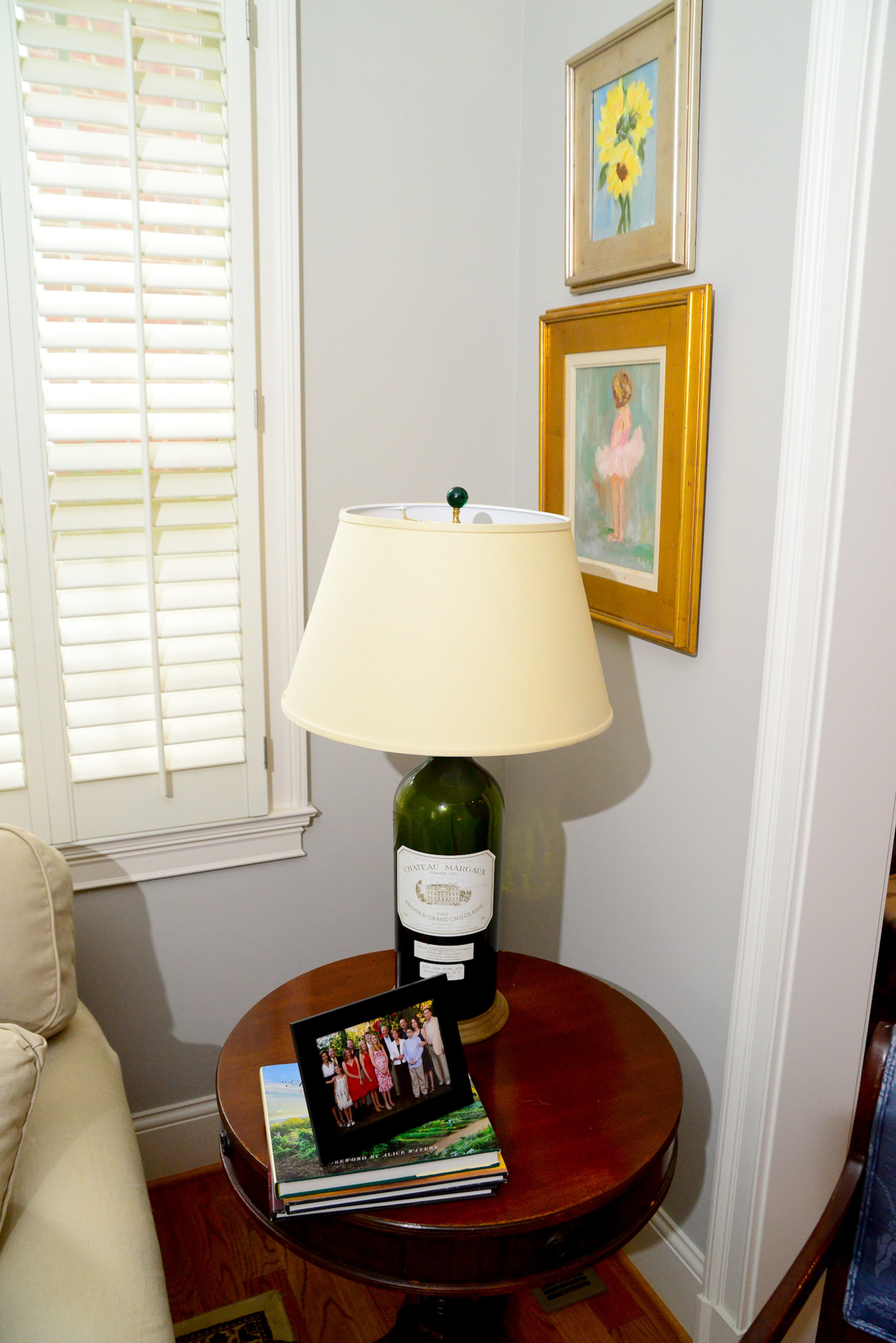 The massive wine bottle used for a lamp is a token from an engagement party that the homeowners' friend, Tom Murphy, hosted at his Virginia-Highland restaurant, Murphy's. The light fixture was made by Lamp Arts.