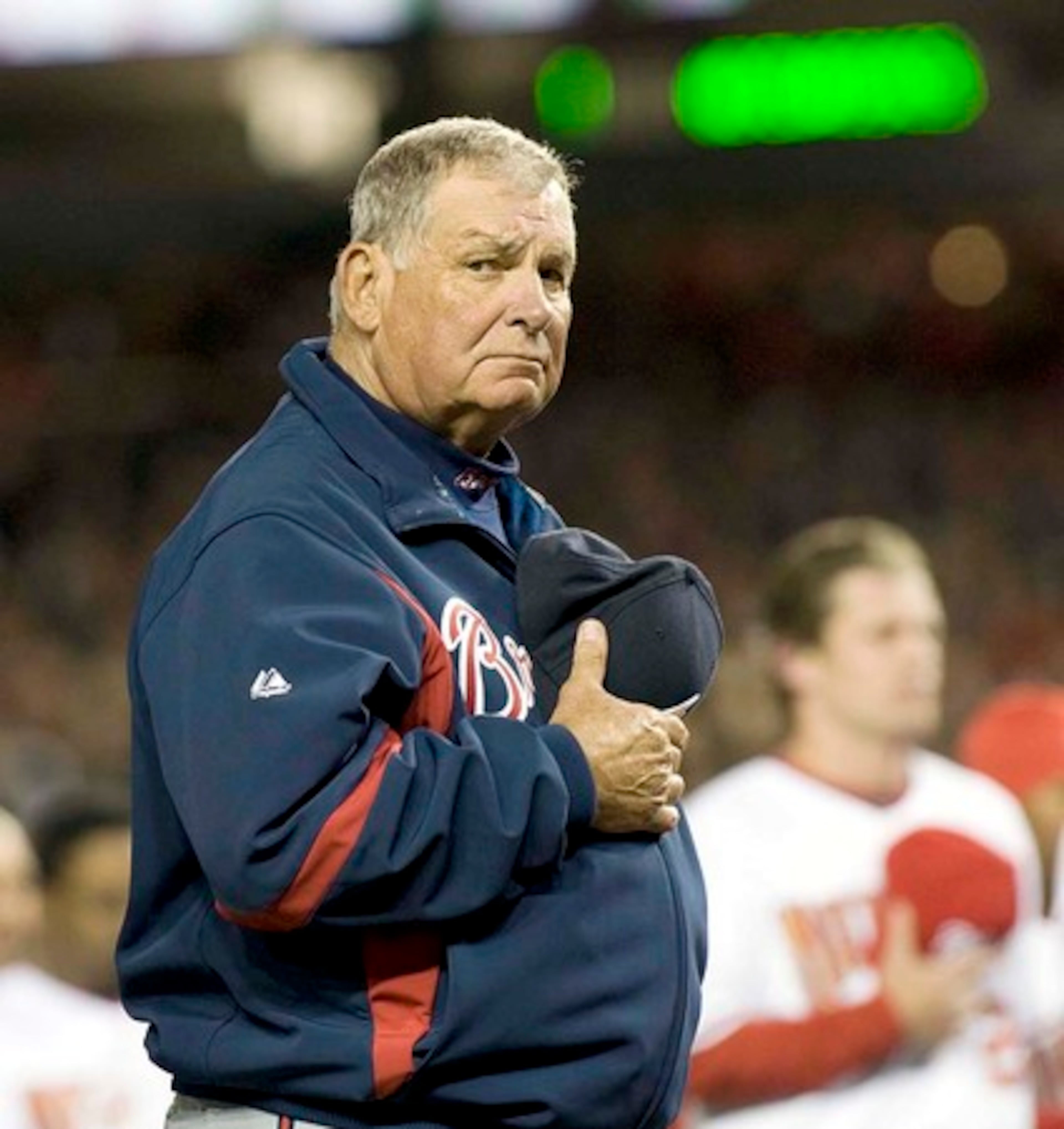 Bobby Cox stands for the national anthem. (Rick McKay/AJC file)