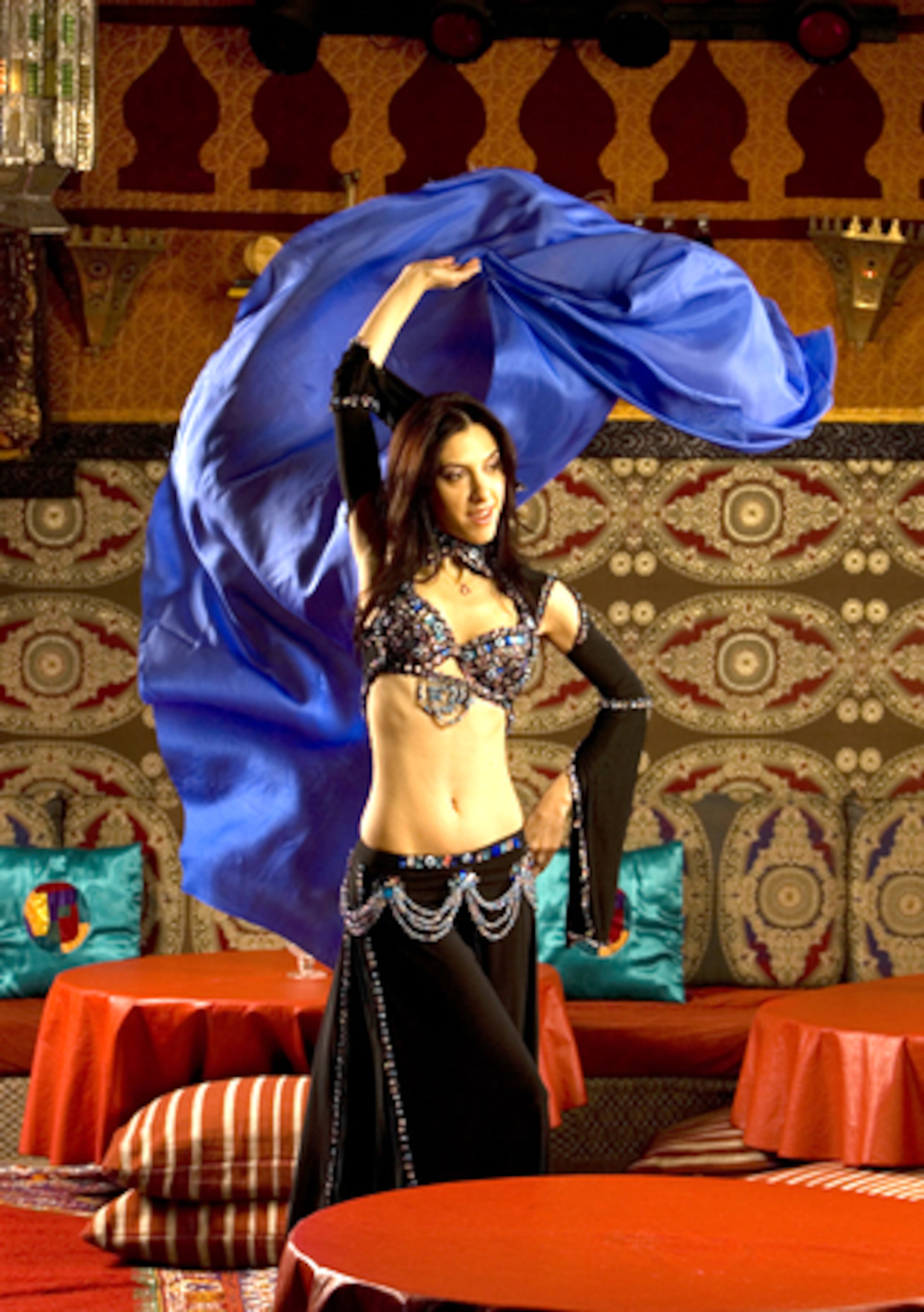 Dilara demonstrates some of her belly dancing technique at Imperial Fez, where guests are encouraged to join in.